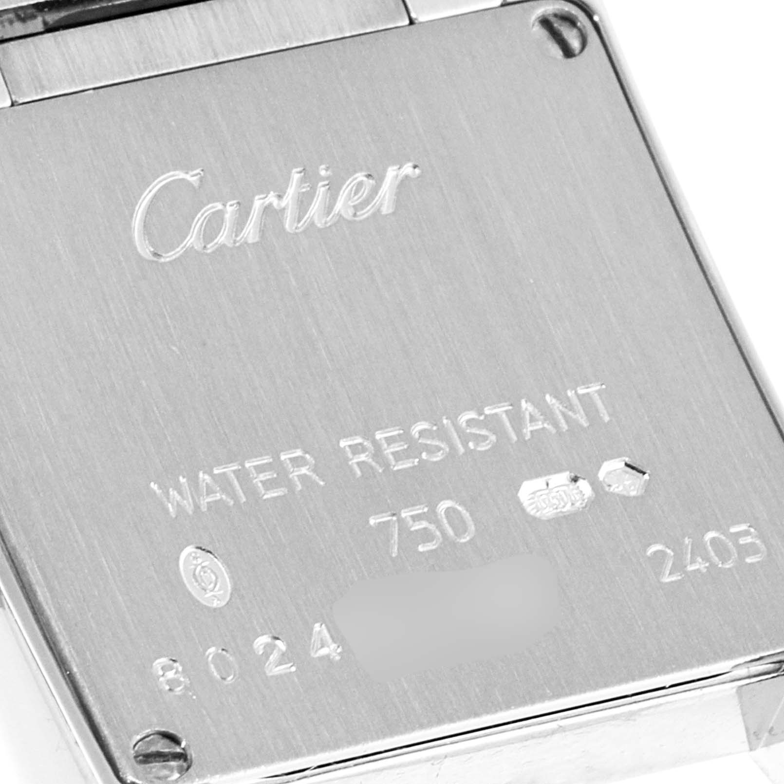 This image shows the back case of the Cartier Tank Française watch, highlighting brand markings and water resistance information.