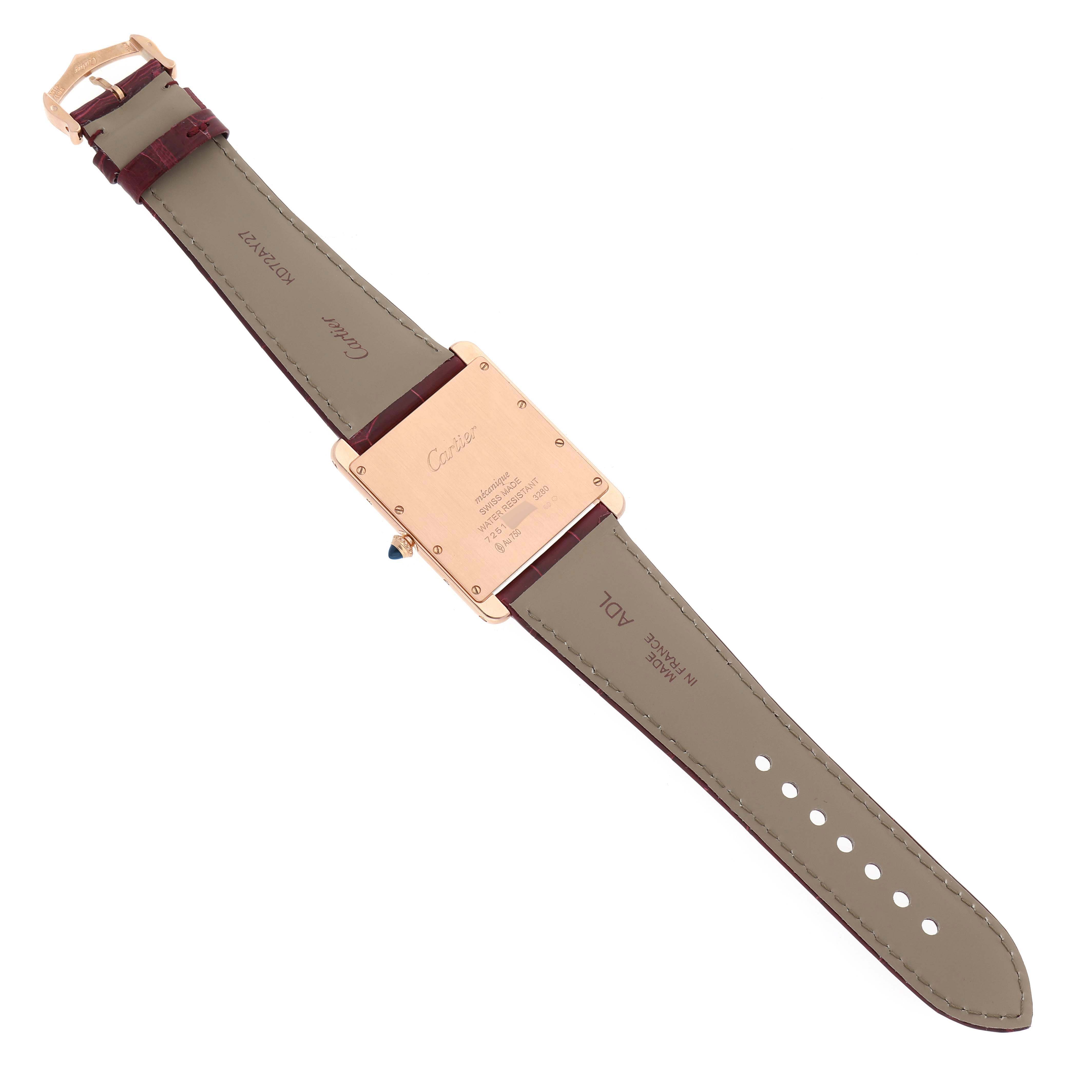 The image shows the back view of a Tank Louis model by Cartier, displaying the rear casing and straps.