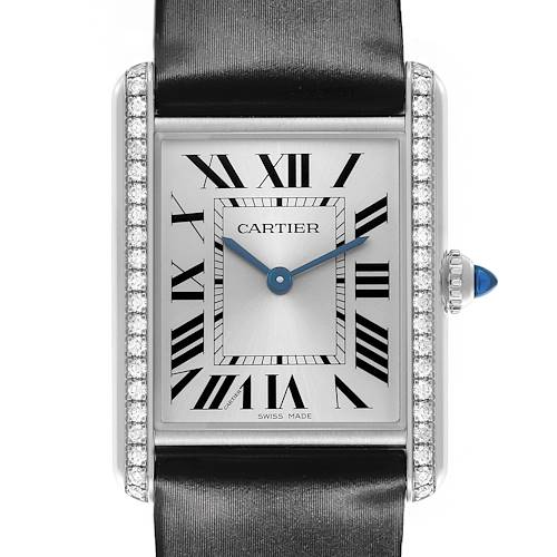 The Cartier Tank Must W4TA0017 Women's Stainless Steel Silver Dial watch is shown from the front, highlighting its rectangular face, Roman numerals, and gem-encrusted edges.