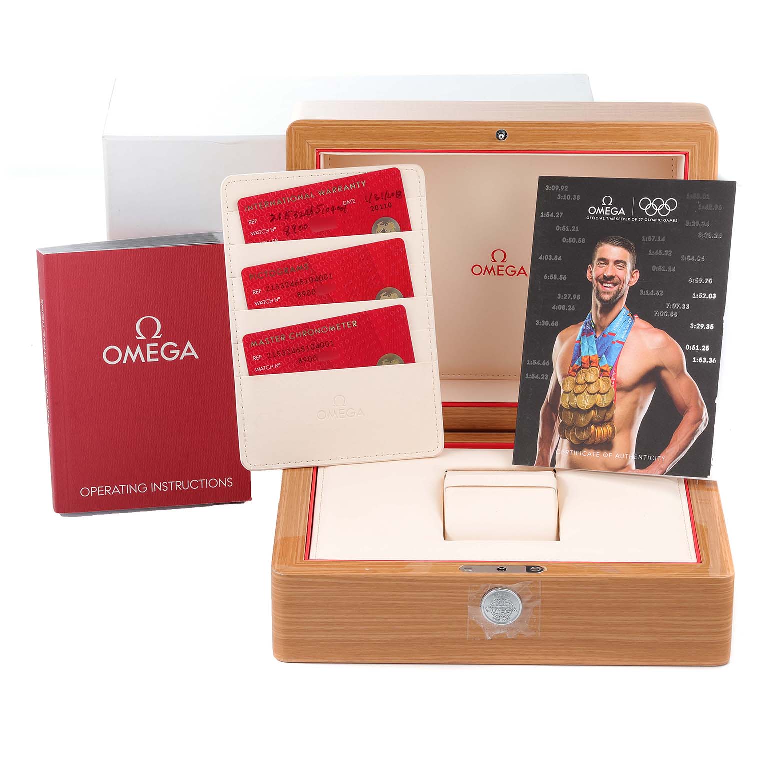 The image shows the Omega Planet Ocean 215.32.46.51.04.001 Men's Stainless Steel White Dial 215.32.46.51.04.001 Men's Stainless Steel White Dial watch box, operating instructions, warranty cards, and a promotional card.