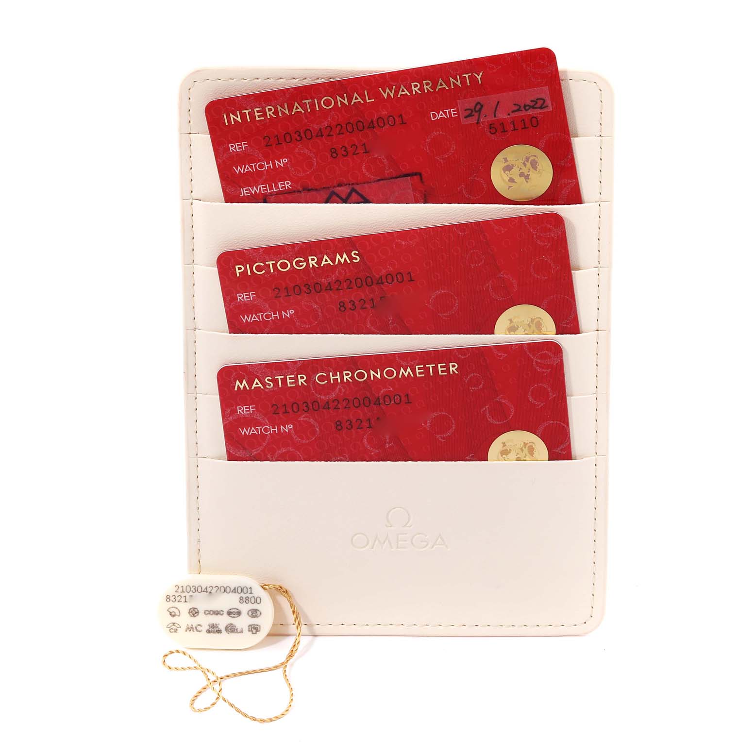 The image shows Omega Seamaster 210.30.42.20.04.001 Men
s Stainless Steel White Dial 210.30.42.20.04.001 Men
s Stainless Steel White Dial model cards including international warranty, pictograms, and Master Chronometer in a wallet, along with a tag.