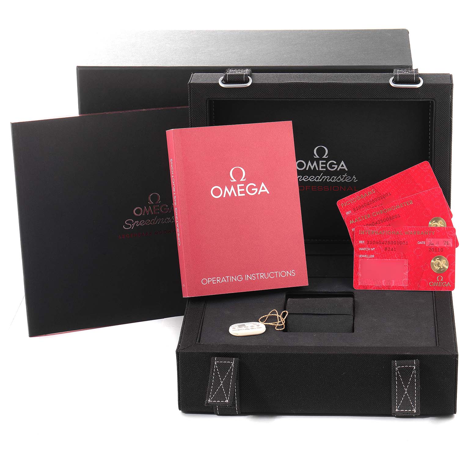 The image features accessories for the Omega Speedmaster 310.60.42.50.01.001 Men's Rose Gold Black Dial 310.60.42.50.01.001 Men's Rose Gold Black Dial watch, including its box, operating instructions, and warranty cards.