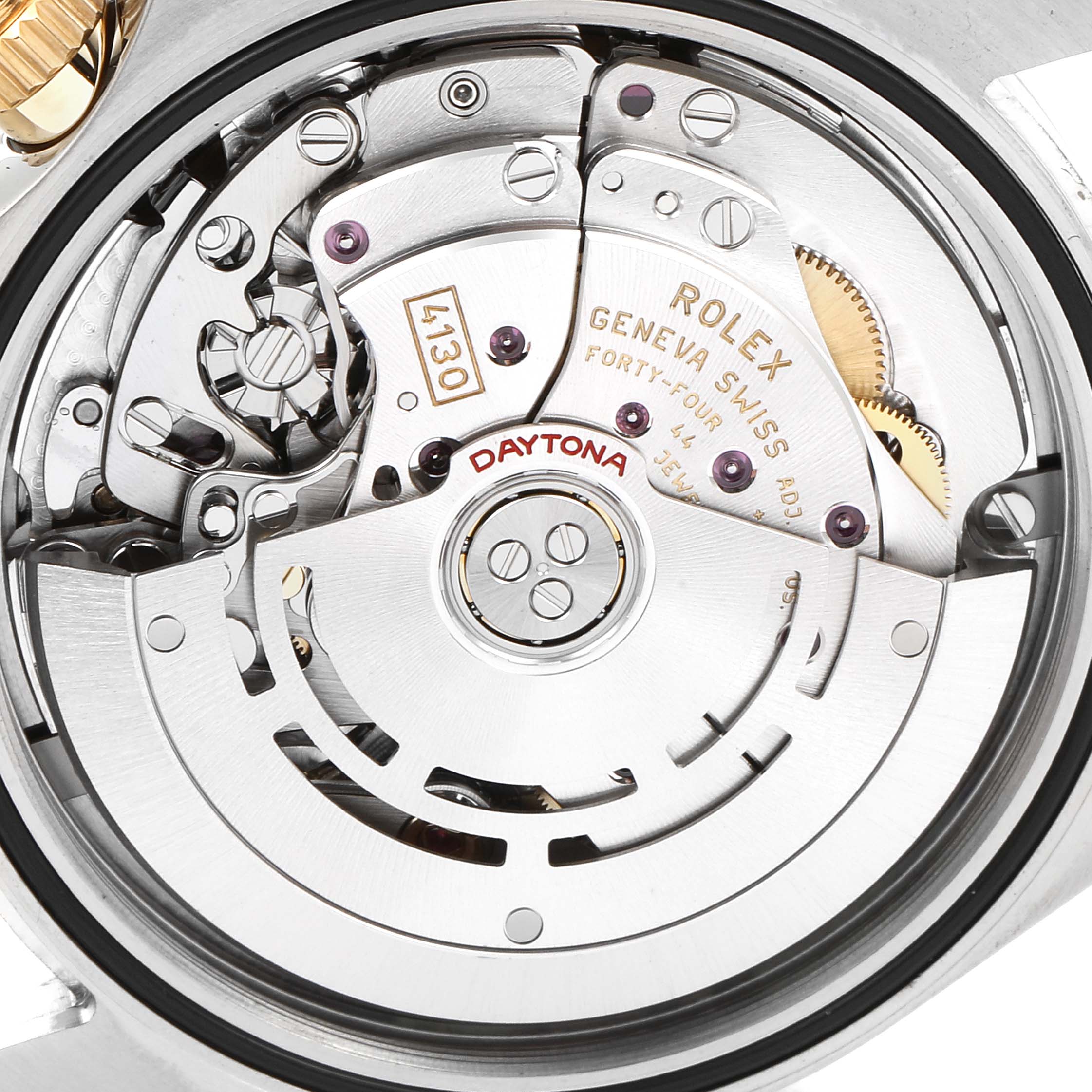 This image shows the movement and internal mechanics of a Rolex Daytona 116503 Men's Steel and Gold (two tone) Mother of Pearl Dial 116503 Men's Steel and Gold (two tone) Mother of Pearl Dial watch at a close-up angle.