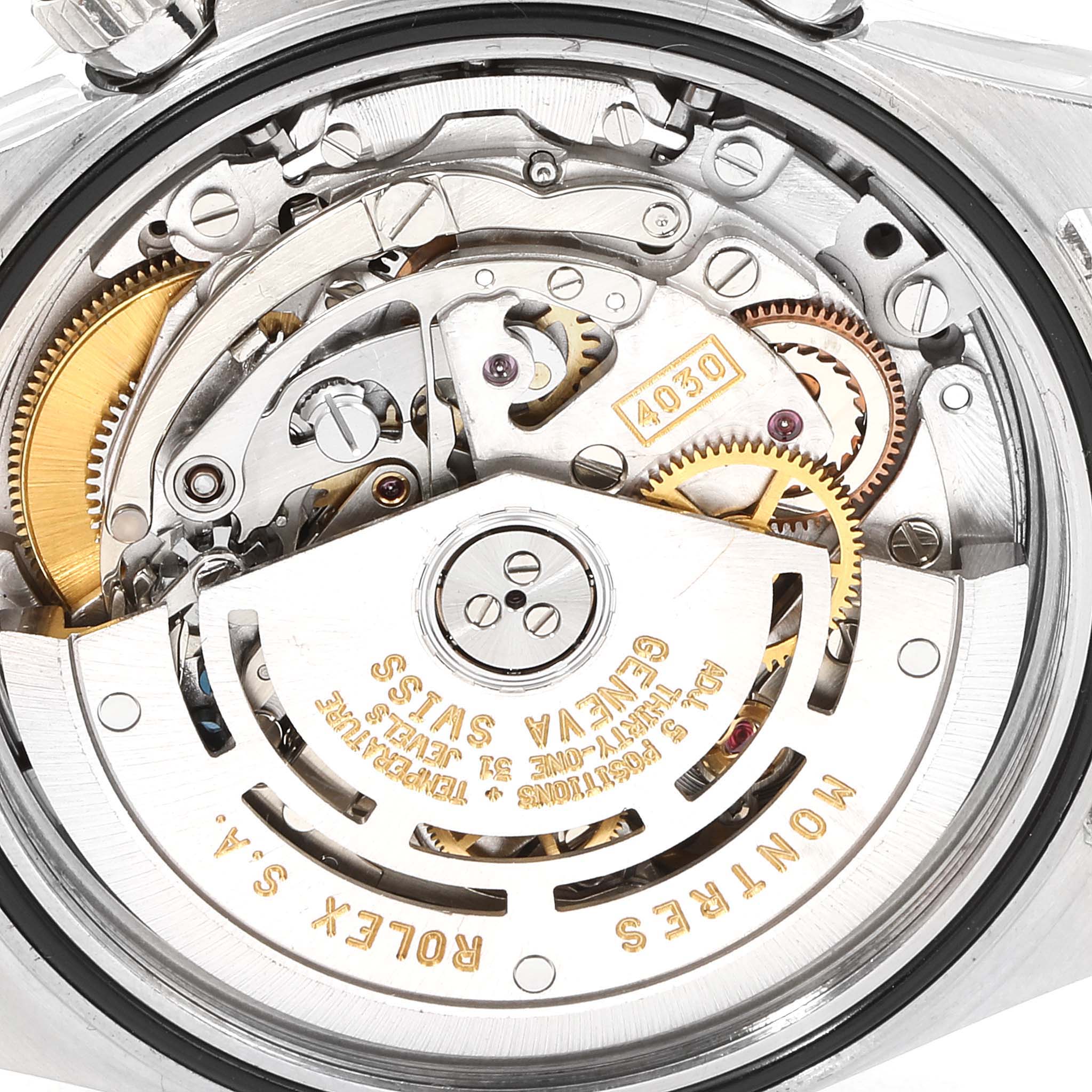 This image shows the inner workings and movement of a Rolex Daytona 16520 Men's Stainless Steel White Dial 16520 Men's Stainless Steel White Dial watch, viewed from the back.