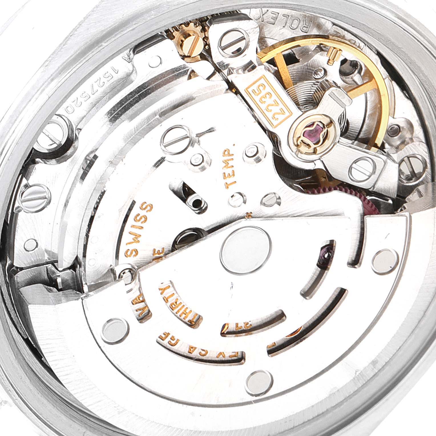 This image shows the close-up view of the movement mechanism of a Rolex Date 79160 Women's Stainless Steel Black Dial 79160 Women's Stainless Steel Black Dial model watch.