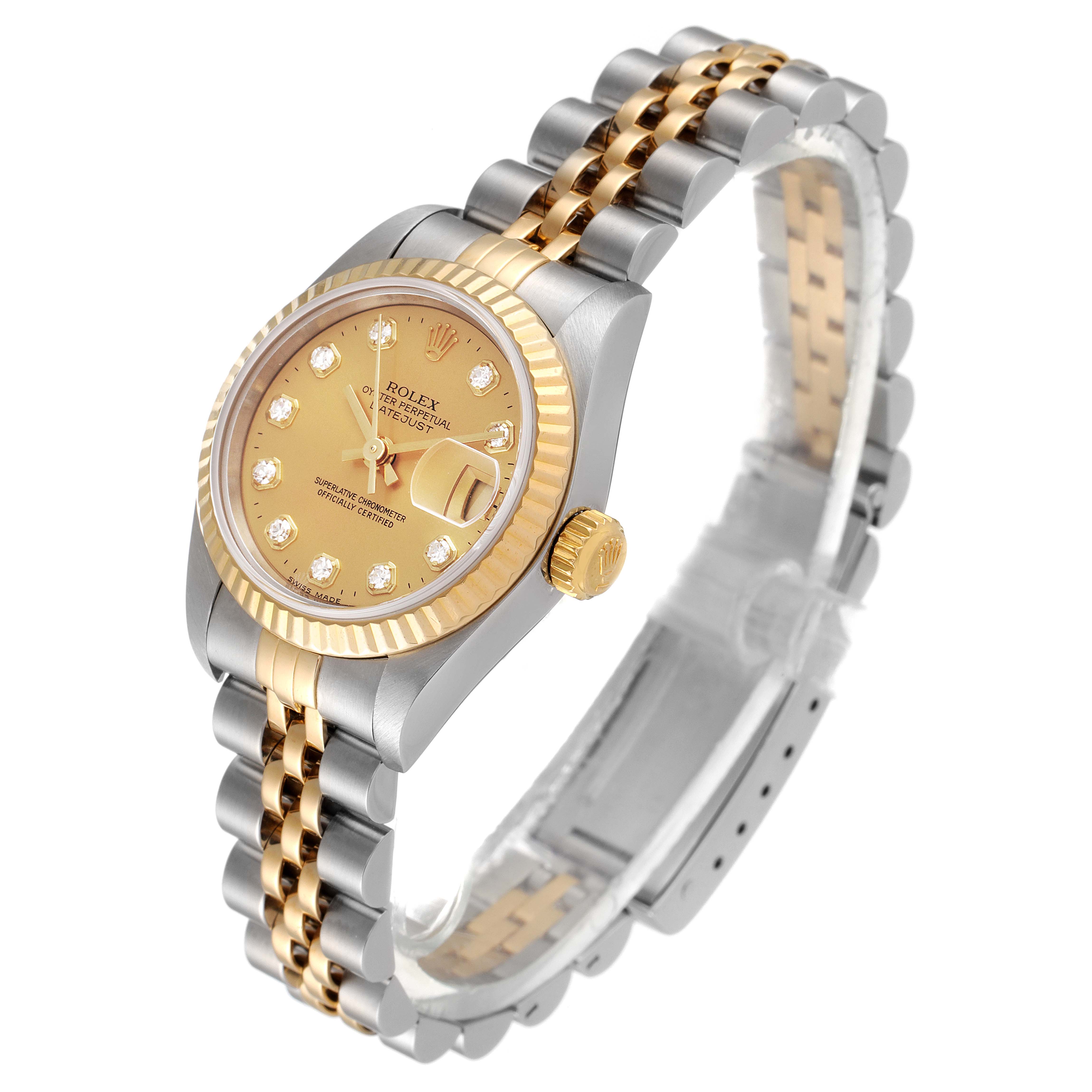 This image shows the Rolex Datejust 69173 Women
s Steel and Gold (two tone) Champagne Dial 69173 Women
s Steel and Gold (two tone) Champagne Dial watch at an angled side view, highlighting its two-tone bracelet, dial, and fluted bezel.