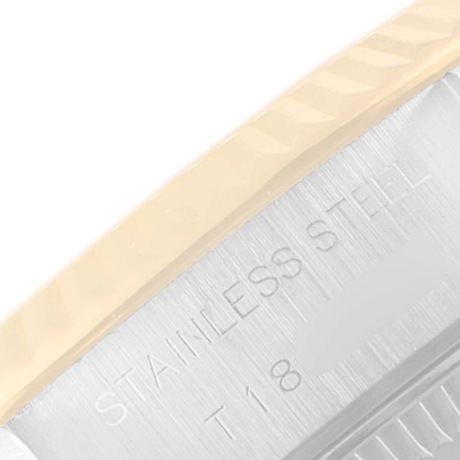 The image shows a close-up side view of the stainless steel casing with engravings for a Rolex Datejust 69173 Women
s Steel and Gold (two tone) Champagne Dial 69173 Women
s Steel and Gold (two tone) Champagne Dial watch.