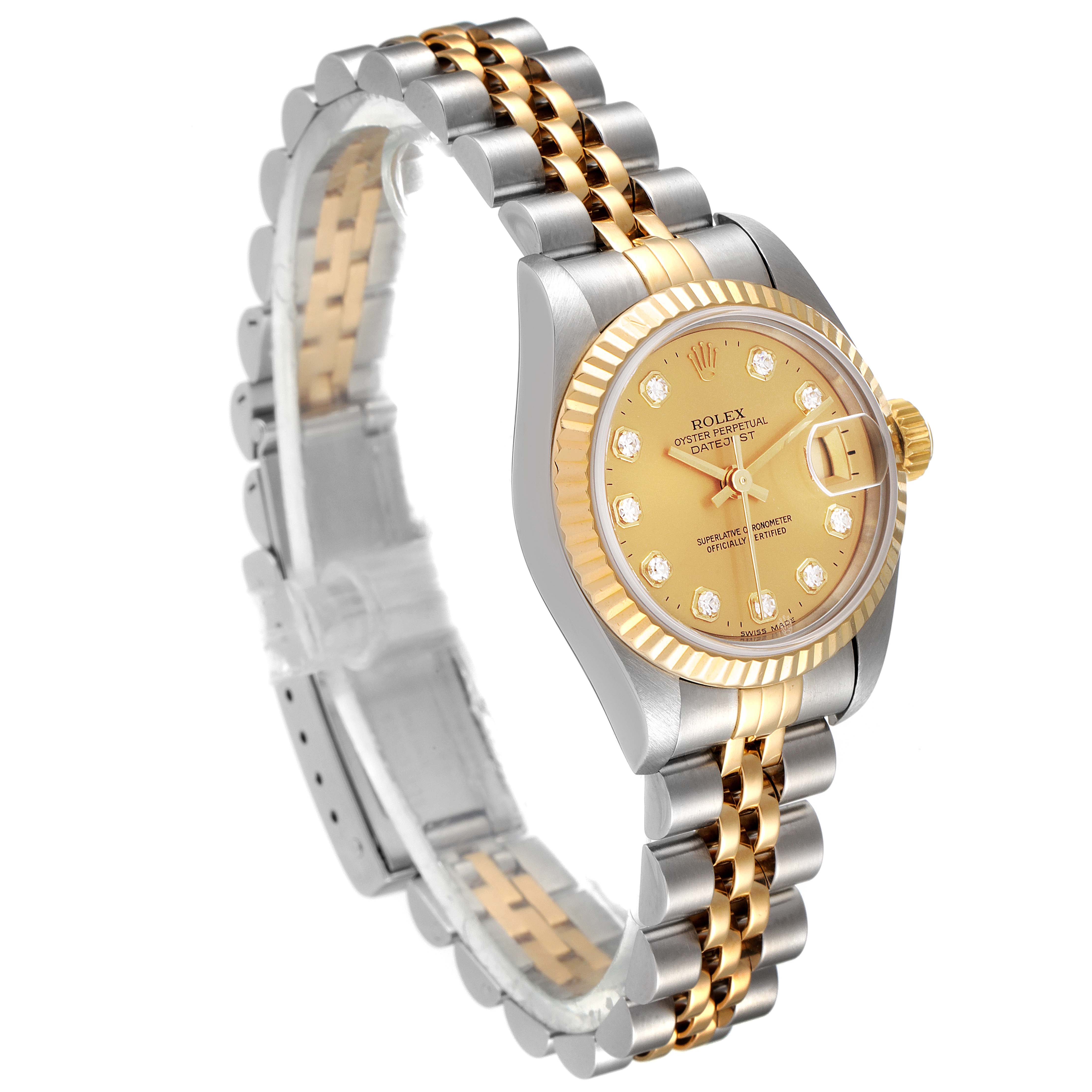 The image shows a side angle of a Rolex Datejust 69173 Women
s Steel and Gold (two tone) Champagne Dial 69173 Women
s Steel and Gold (two tone) Champagne Dial watch featuring its two-tone bracelet and gold dial.