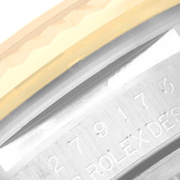 The image shows a close-up of the serial number and part of the bezel on a Rolex Datejust 279173 Women's Steel and Gold (two tone) Champagne Dial 279173 Women's Steel and Gold (two tone) Champagne Dial watch.