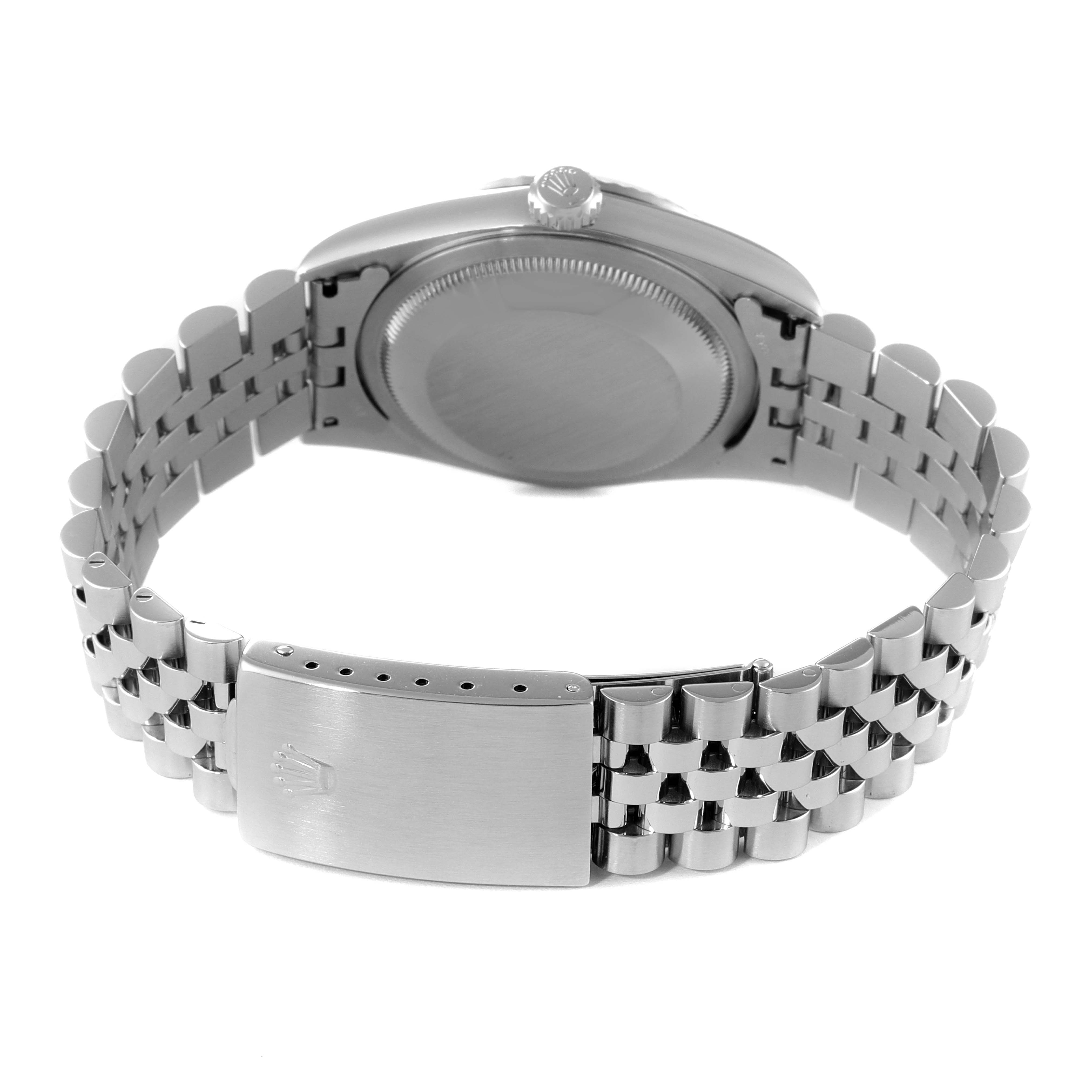 This image shows the back of a Rolex Datejust 16234 Men's Stainless Steel Silver Dial 16234 Men's Stainless Steel Silver Dial watch, specifically featuring its case back, jubilee bracelet, and clasp.