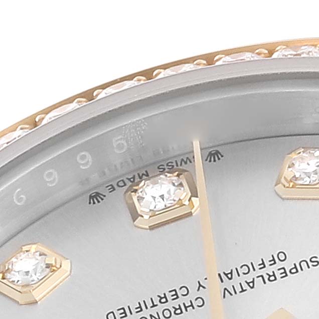 This image shows a close-up of the dial, diamonds, and part of the bezel of a Rolex Datejust 279383RBR Women's Steel and Gold (two tone) Silver Dial 279383RBR Women's Steel and Gold (two tone) Silver Dial watch.