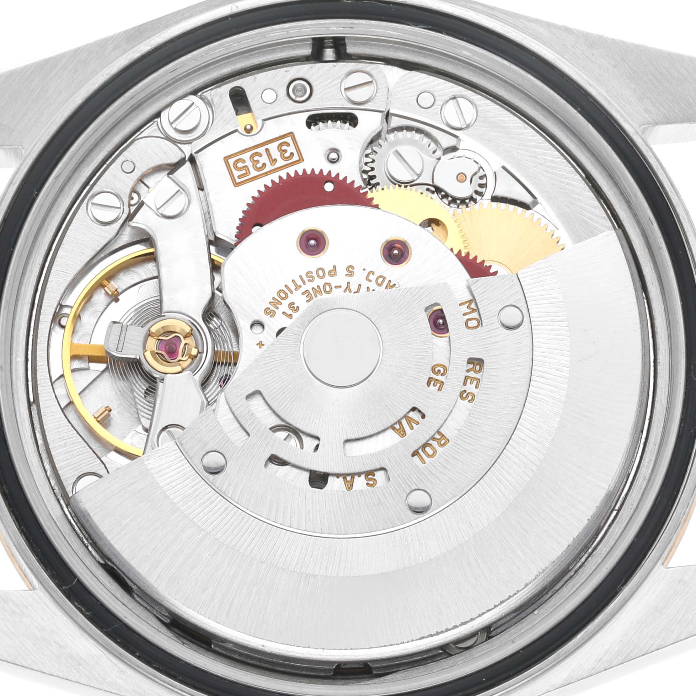 This image shows the internal mechanics of a Rolex Datejust 16233NR Men's Steel and Gold (two tone) Mother of Pearl Dial 16233NR Men's Steel and Gold (two tone) Mother of Pearl Dial model from a close-up, rear-view angle.