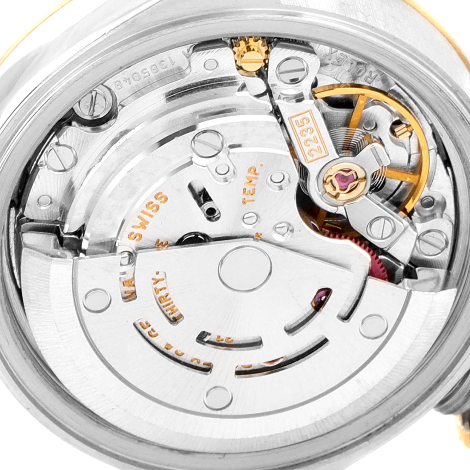 The image shows an internal view of the Rolex Datejust 79173 Women
s Steel and Gold (two tone) Silver Dial 79173 Women
s Steel and Gold (two tone) Silver Dial watch movement from the back, displaying various mechanical components.