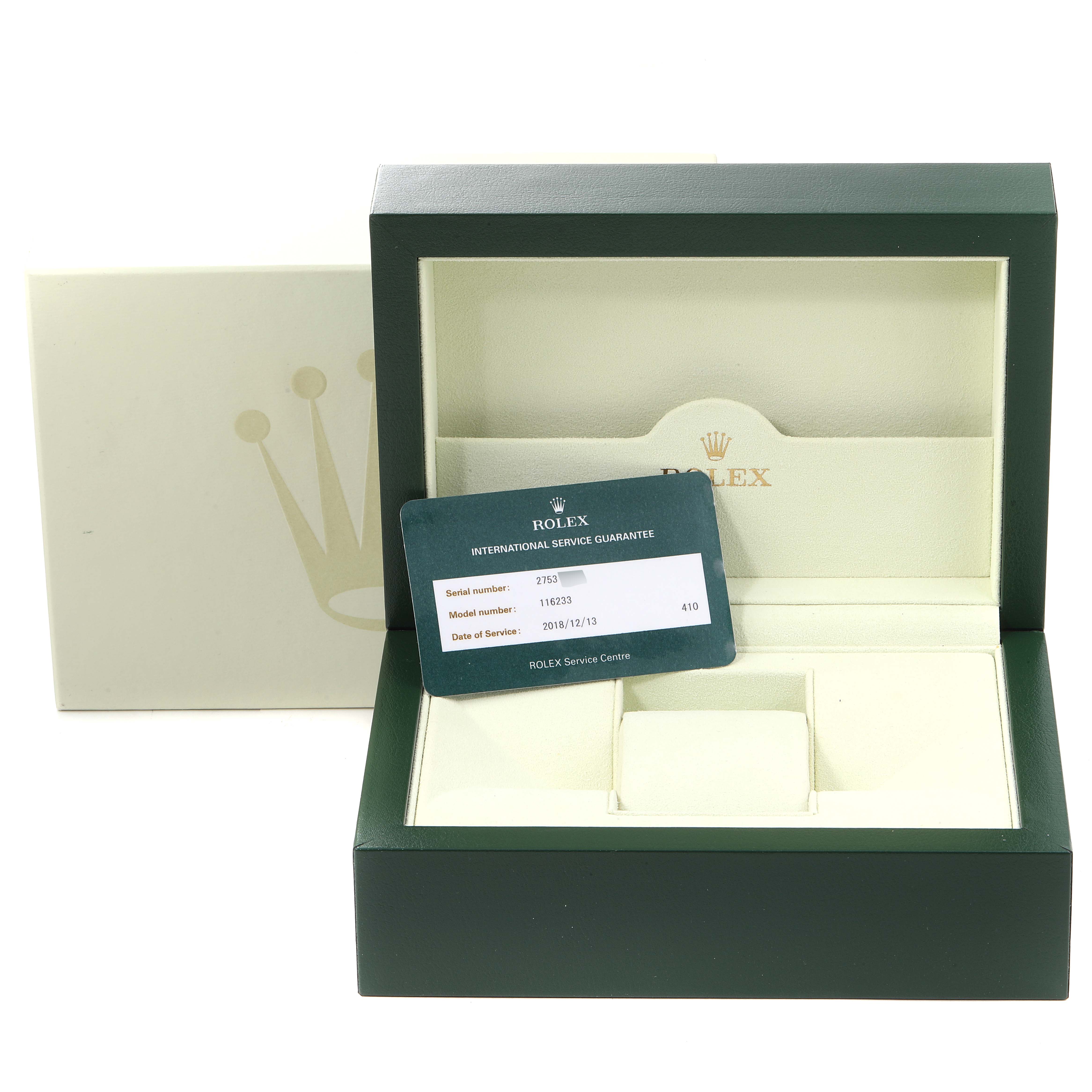This image shows the packaging and international service guarantee card for a Rolex Datejust 116233 Men's Steel and Gold (two tone) White Dial 116233 Men's Steel and Gold (two tone) White Dial watch.