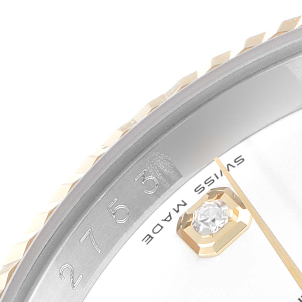 This close-up shows the bezel, part of the dial, the "SWISS MADE" text, and a diamond hour marker of a Rolex Datejust 116233 Men's Steel and Gold (two tone) White Dial 116233 Men's Steel and Gold (two tone) White Dial watch.