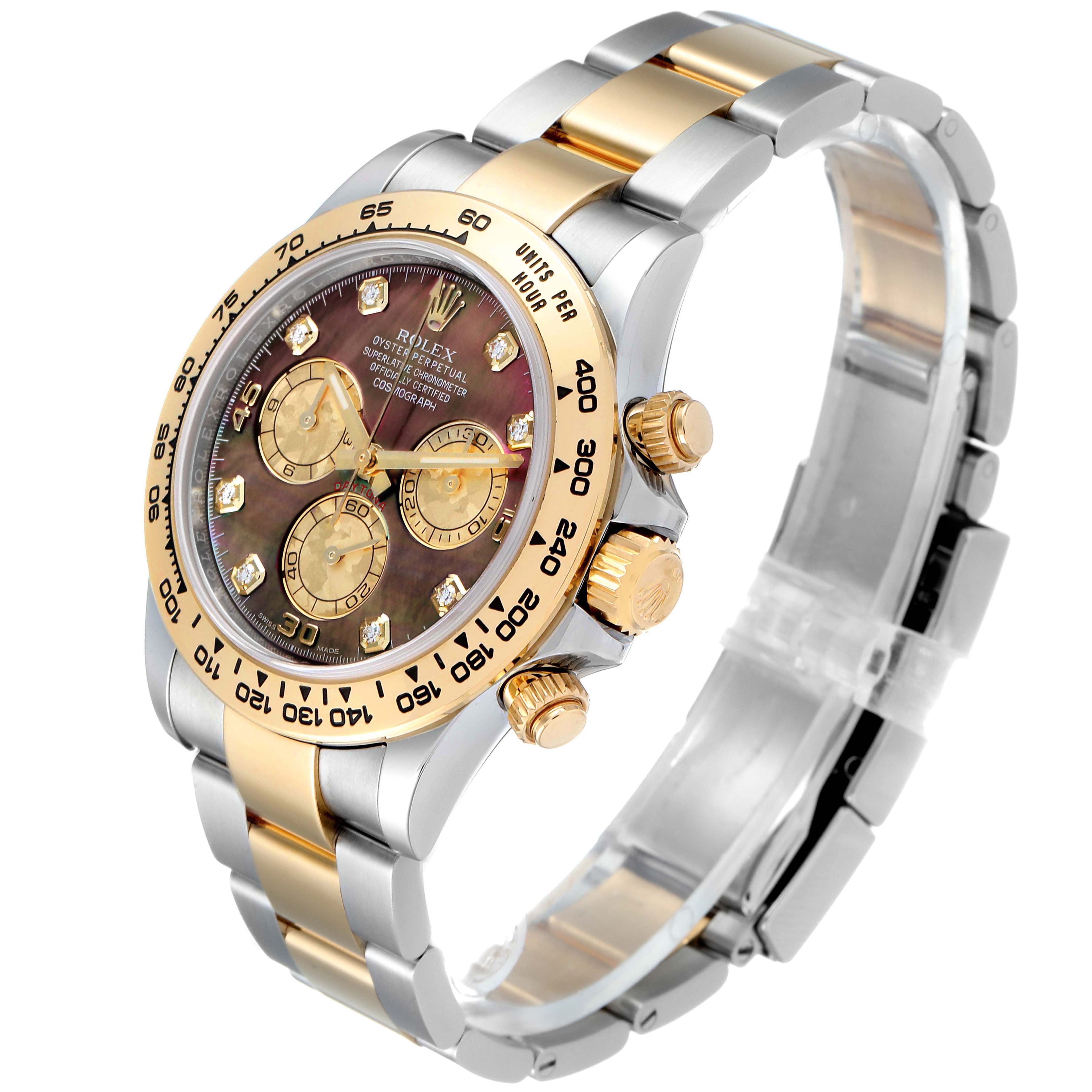 The Rolex Daytona 116503 Men's Steel and Gold (two tone) Mother of Pearl Dial 116503 Men's Steel and Gold (two tone) Mother of Pearl Dial model watch is shown from a three-quarter angle, displaying its face, crown, pushers, and bracelet.
