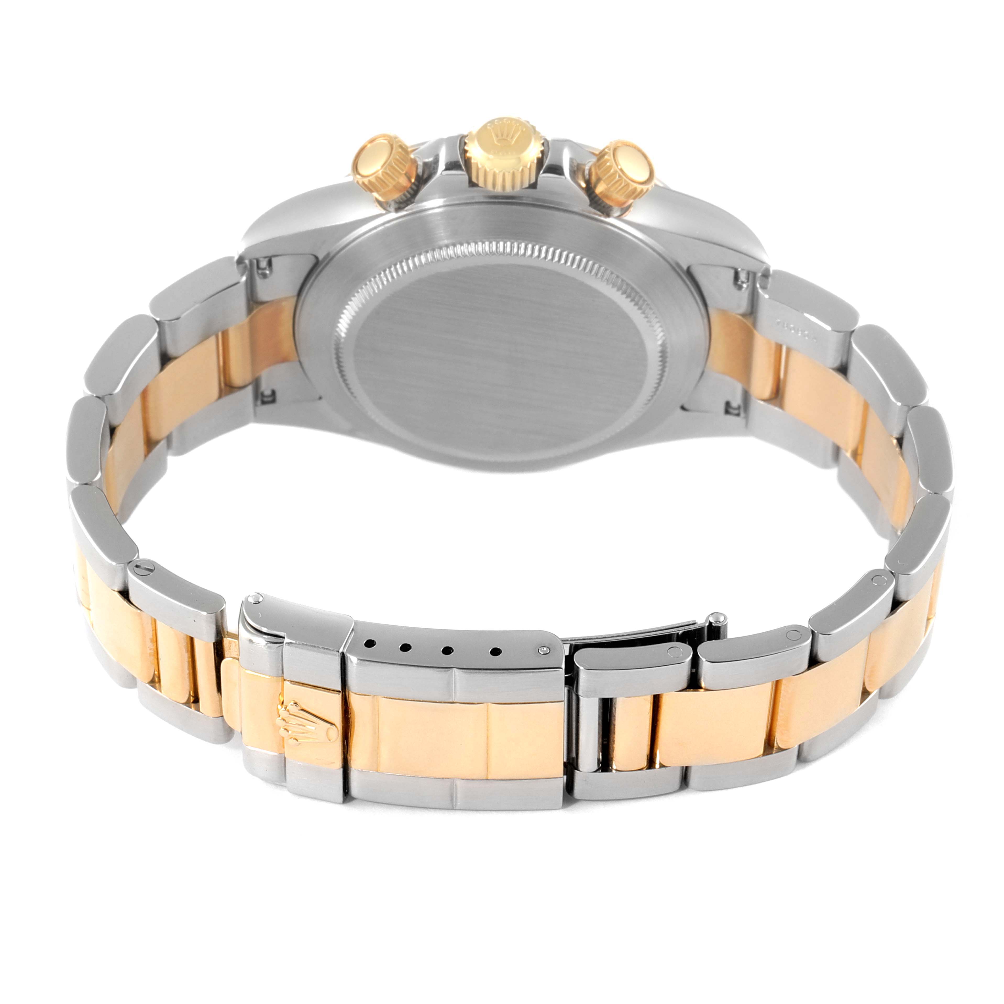 This image shows the back case, bracelet, and clasp of a Rolex Daytona 16523 Men
s Steel and Gold (two tone) Grey Dial 16523 Men
s Steel and Gold (two tone) Grey Dial watch at a rear angle.