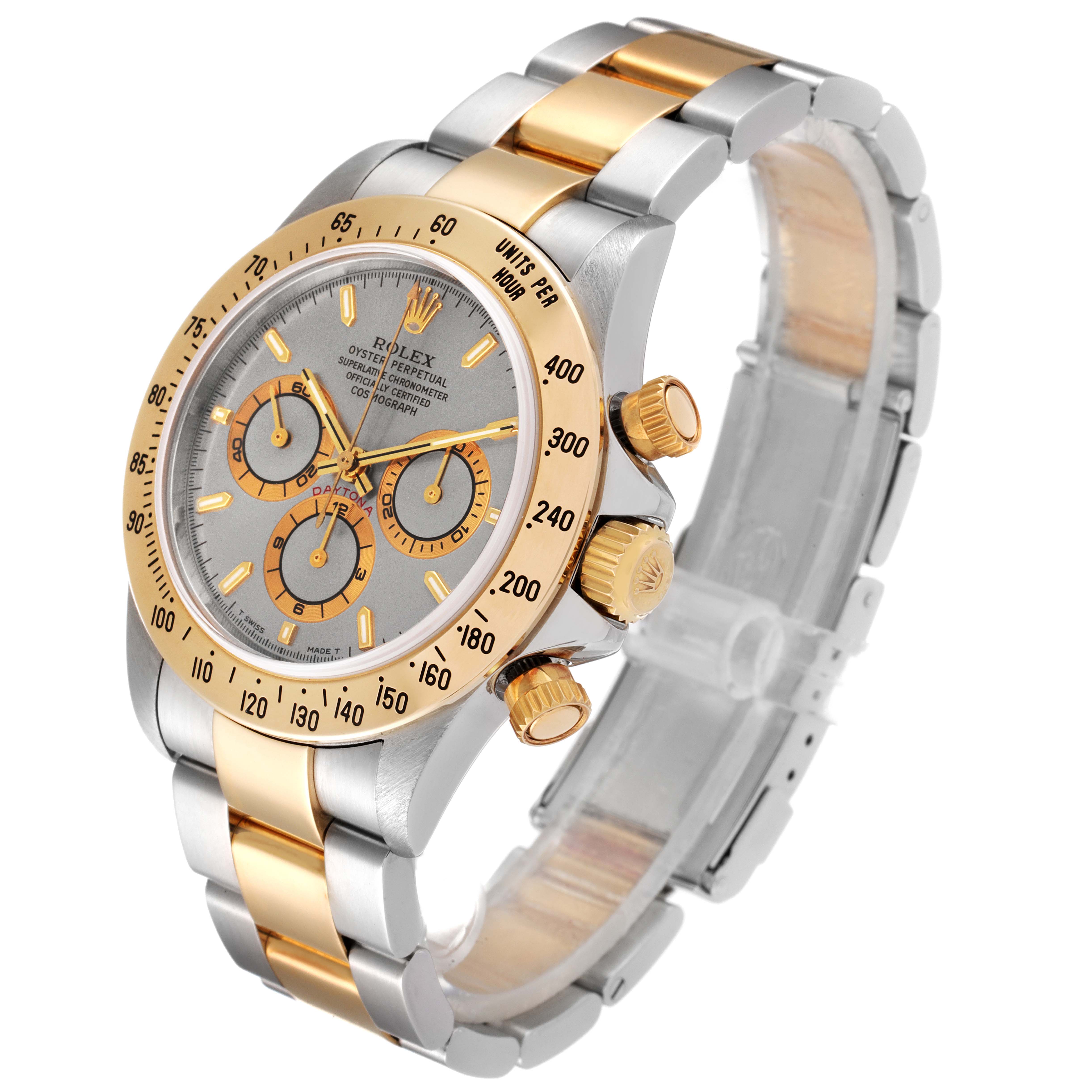 The Rolex Daytona 16523 Men
s Steel and Gold (two tone) Grey Dial 16523 Men
s Steel and Gold (two tone) Grey Dial watch is shown at a slight angle, highlighting the face, bezel, buttons, and two-tone bracelet.
