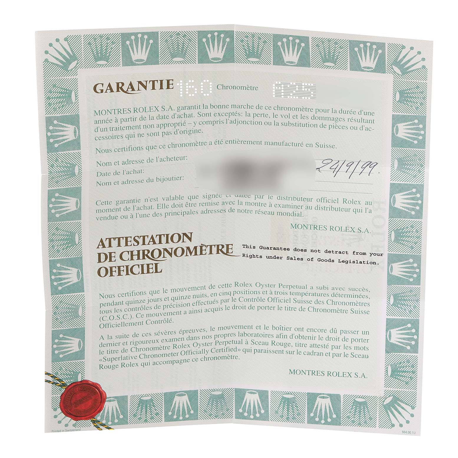 This image shows the warranty and official chronometer certification for a Rolex Daytona 16523 Men
s Steel and Gold (two tone) Grey Dial 16523 Men
s Steel and Gold (two tone) Grey Dial watch from a top-down angle.