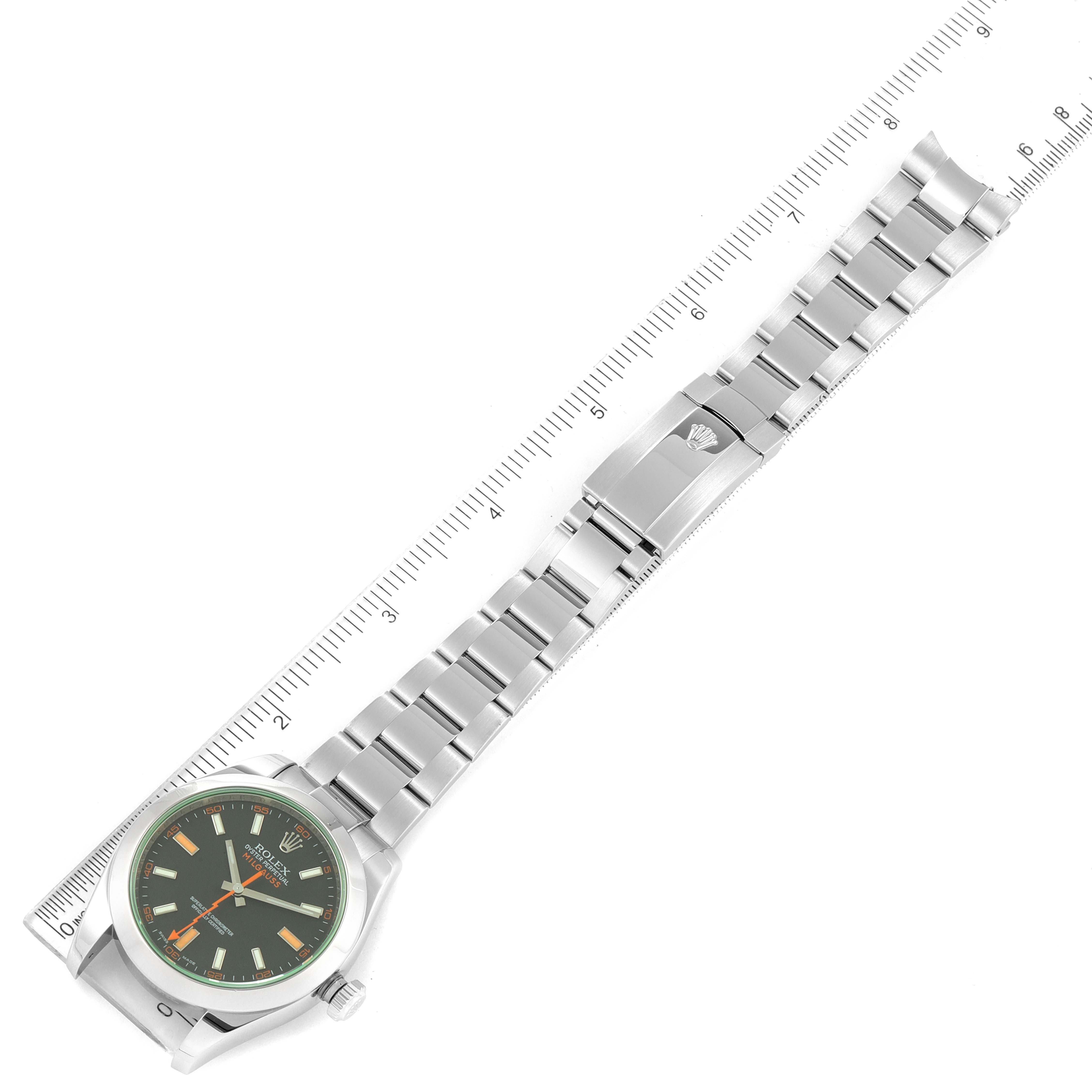 The image shows a top-down view of a Rolex Milgauss 116400V Men's Stainless Steel Black Dial 116400V Men's Stainless Steel Black Dial watch with its stainless steel bracelet and green sapphire crystal.