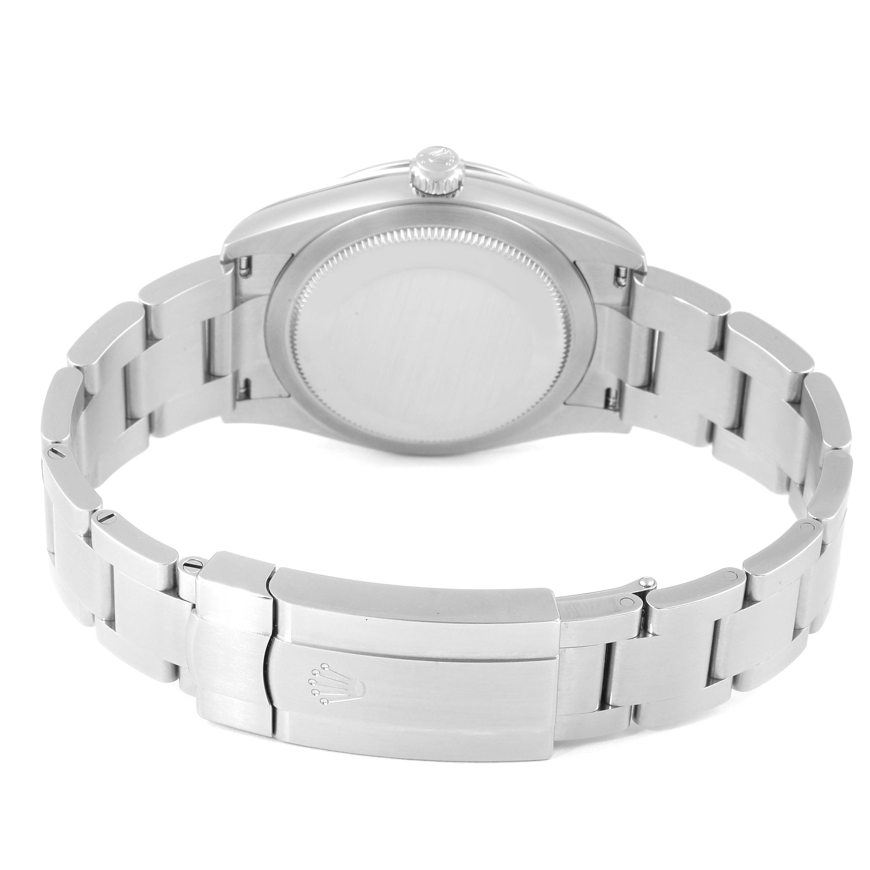 The image shows the back case and bracelet clasp of a Rolex Oyster Perpetual 124200 Men
s Stainless Steel Black Dial 124200 Men
s Stainless Steel Black Dial watch, viewed from the rear.