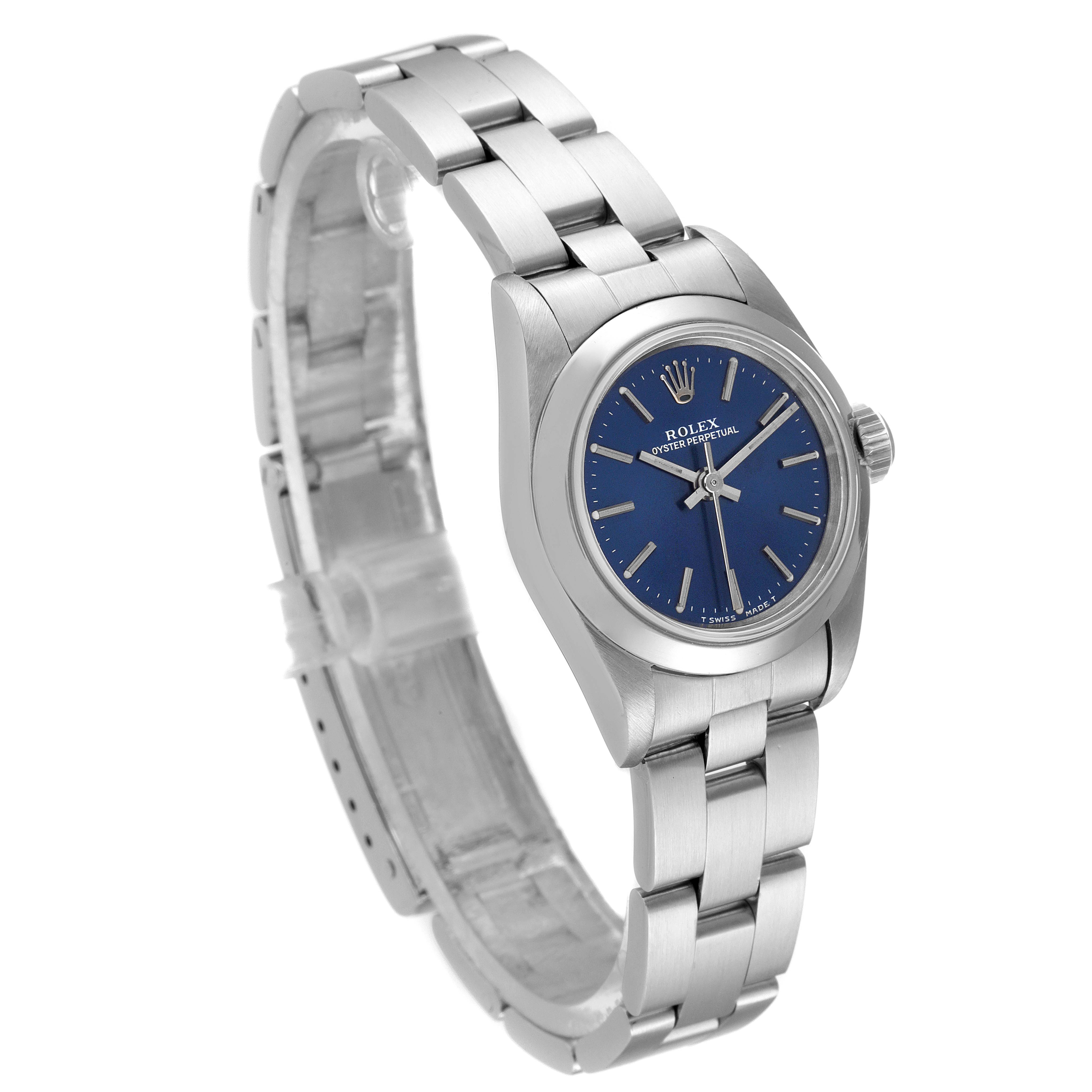 The image shows a Rolex Oyster Perpetual 67180 Women
s Stainless Steel Blue Dial 67180 Women
s Stainless Steel Blue Dial watch angled from the left side, highlighting the face and partially open bracelet.