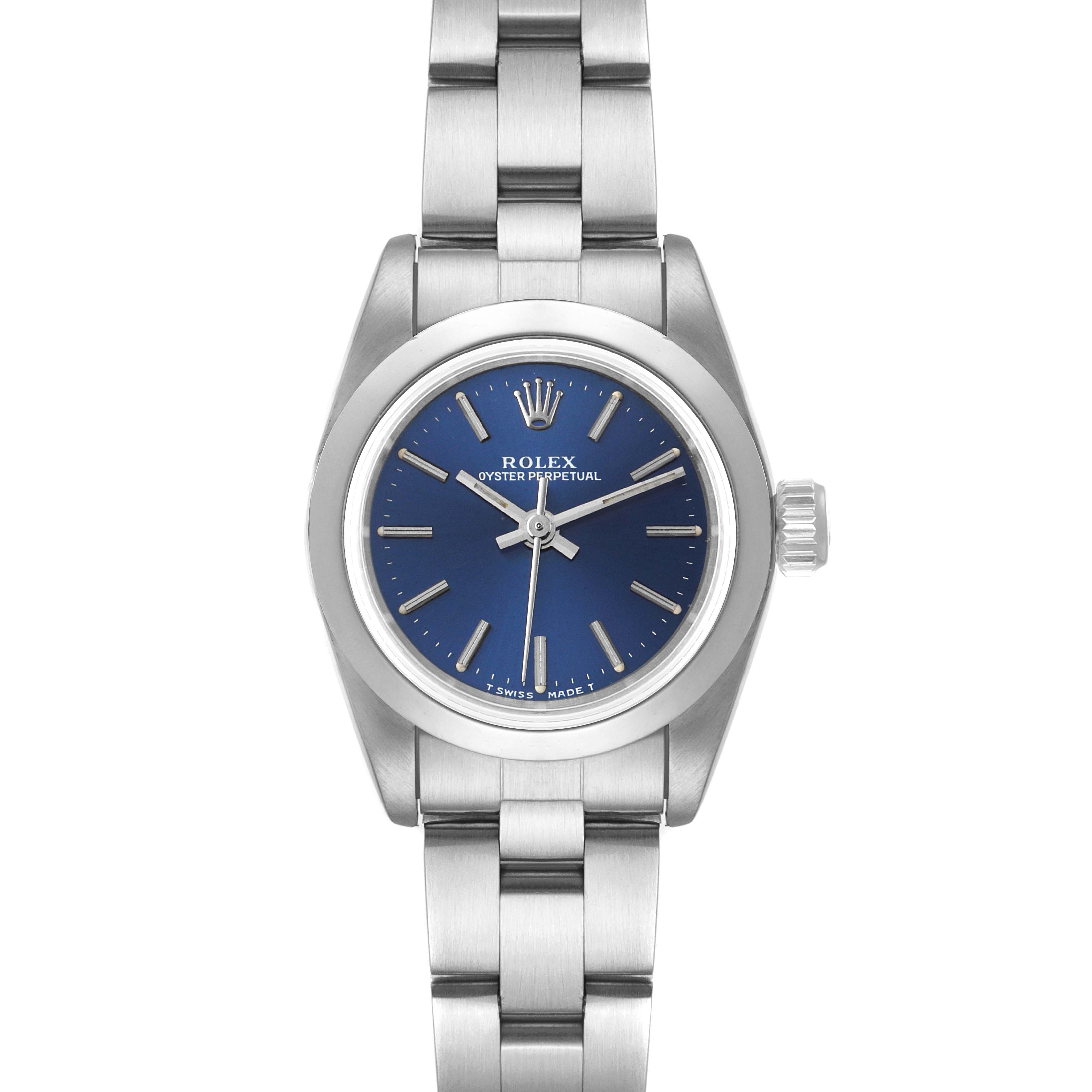 This Rolex Oyster Perpetual 67180 Women
s Stainless Steel Blue Dial 67180 Women
s Stainless Steel Blue Dial watch is shown from a top-down angle, displaying its blue dial and stainless steel bracelet.