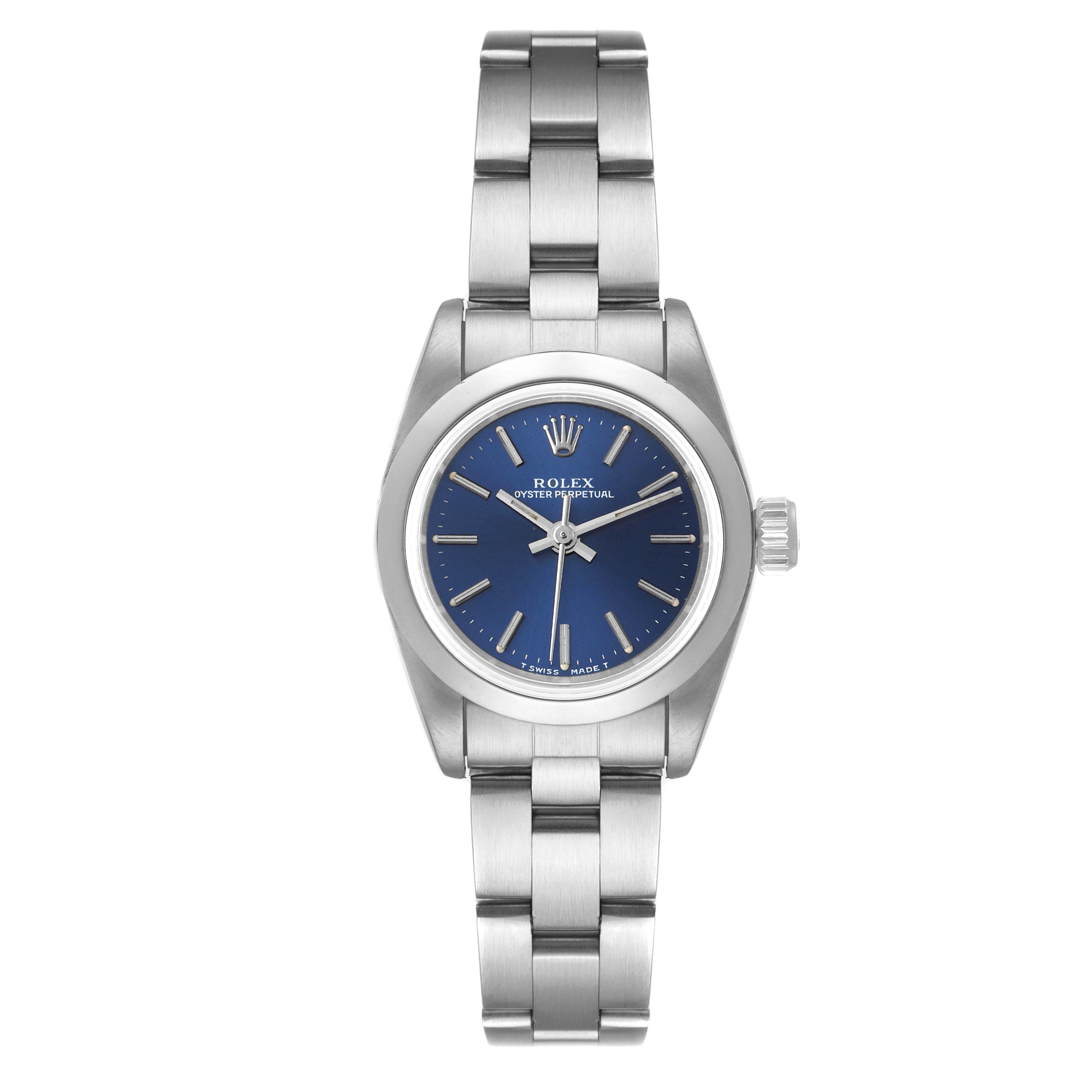 The image shows a frontal view of a Rolex Oyster Perpetual 67180 Women
s Stainless Steel Blue Dial 67180 Women
s Stainless Steel Blue Dial watch with a blue dial and stainless steel bracelet.