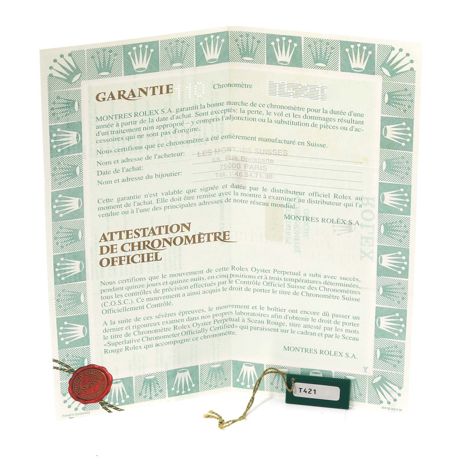 This image shows the guarantee and official chronometer certification for the Rolex Oyster Perpetual 67243 Women's Steel and Gold (two tone) Champagne Dial 67243 Women's Steel and Gold (two tone) Champagne Dial, laid flat and partially folded.