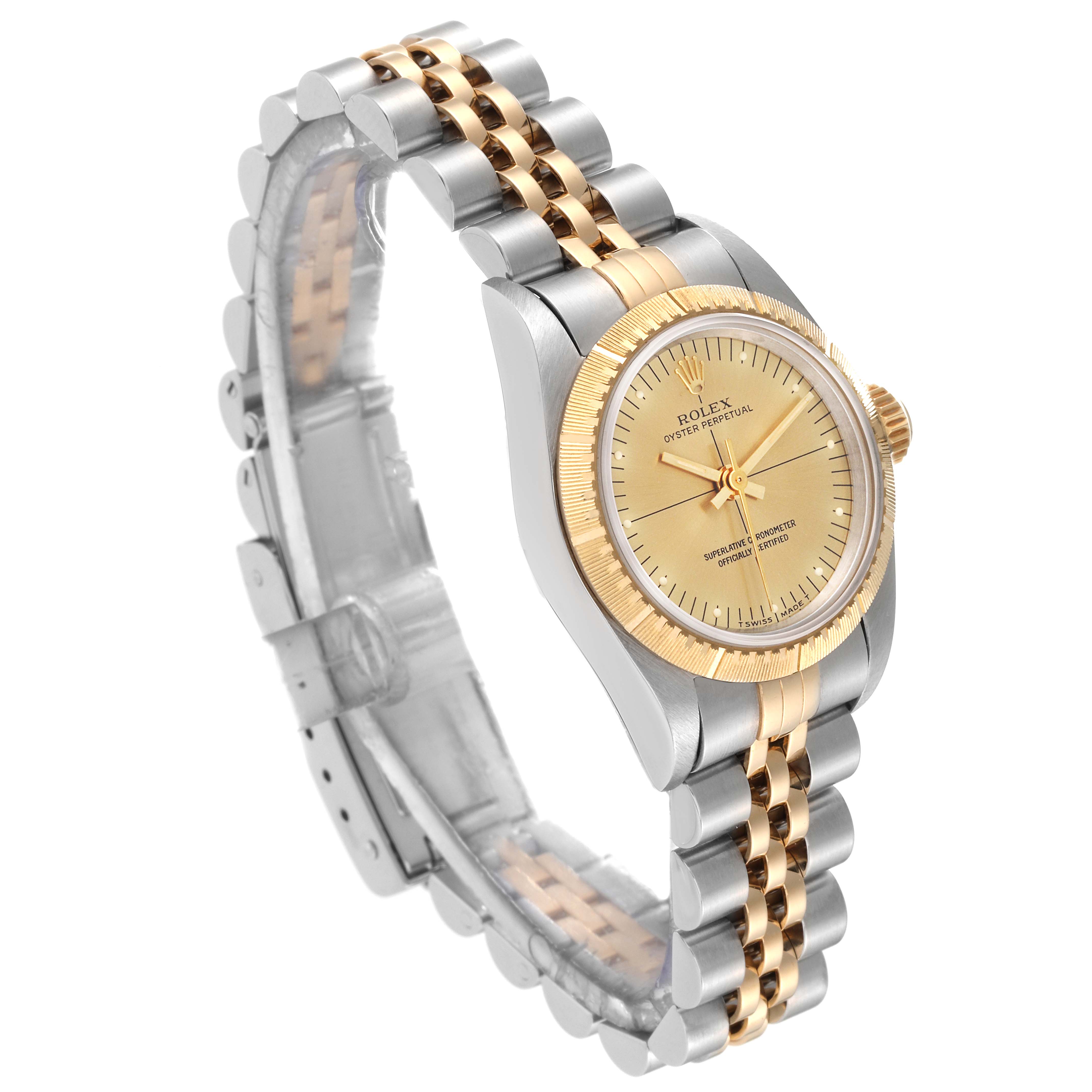 The image shows a Rolex Oyster Perpetual 67243 Women's Steel and Gold (two tone) Champagne Dial 67243 Women's Steel and Gold (two tone) Champagne Dial watch at an angled side view, highlighting its two-tone bracelet and gold bezel and dial.