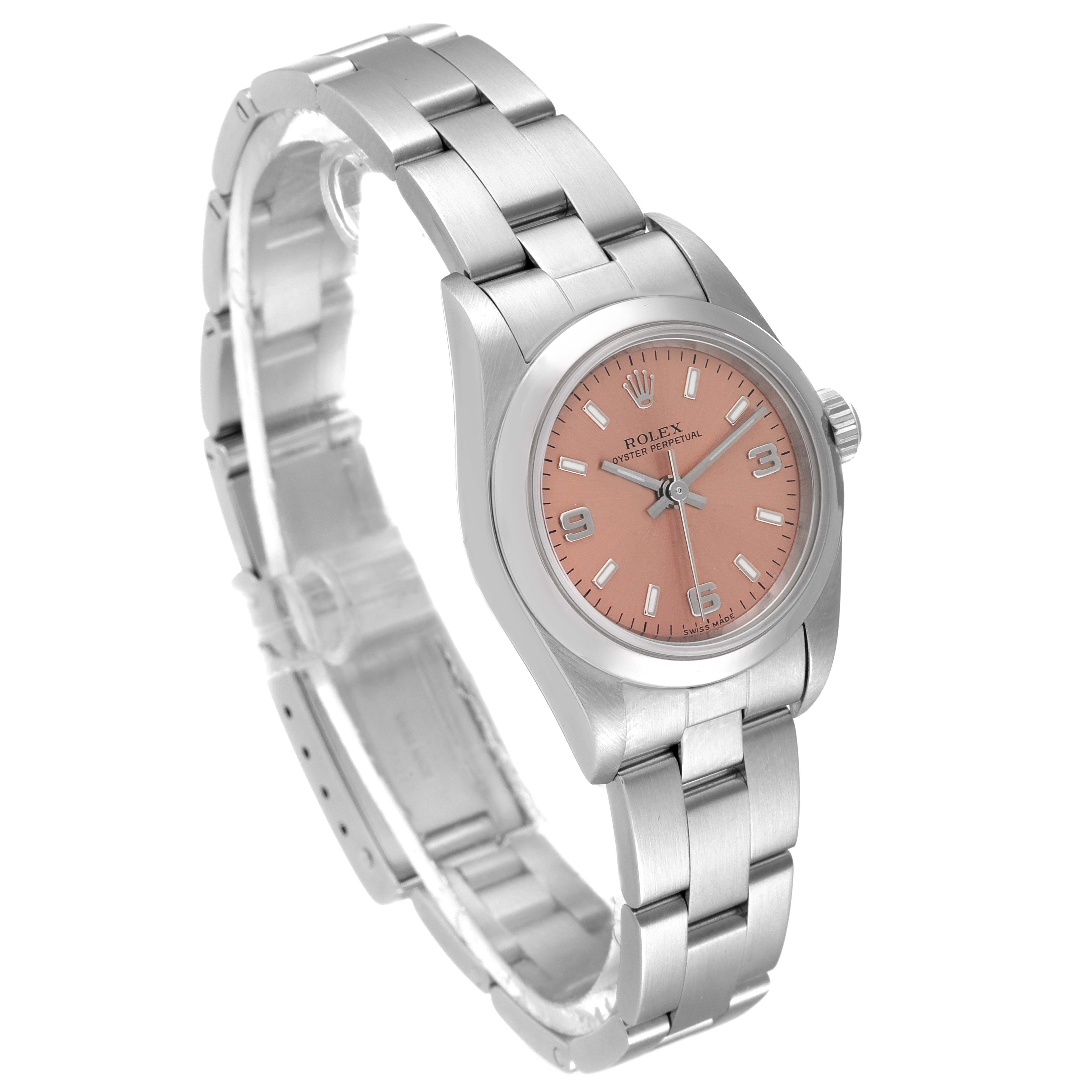 This Rolex Oyster Perpetual 76080 Women
s Stainless Steel Pink Dial 76080 Women
s Stainless Steel Pink Dial watch is shown at a three-quarter angle, displaying its face, bezel, crown, and stainless steel bracelet.