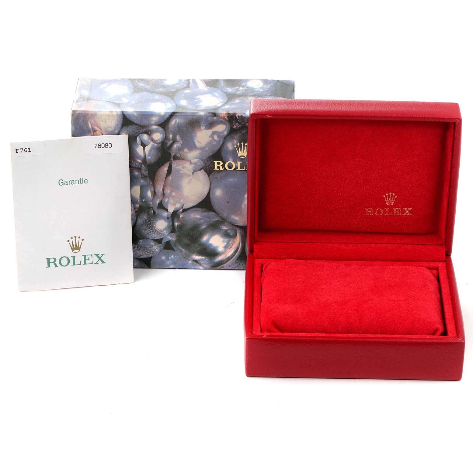 This image shows a Rolex Oyster Perpetual 76080 Women
s Stainless Steel Pink Dial 76080 Women
s Stainless Steel Pink Dial model
s box, inner case, and warranty card from a front angle.