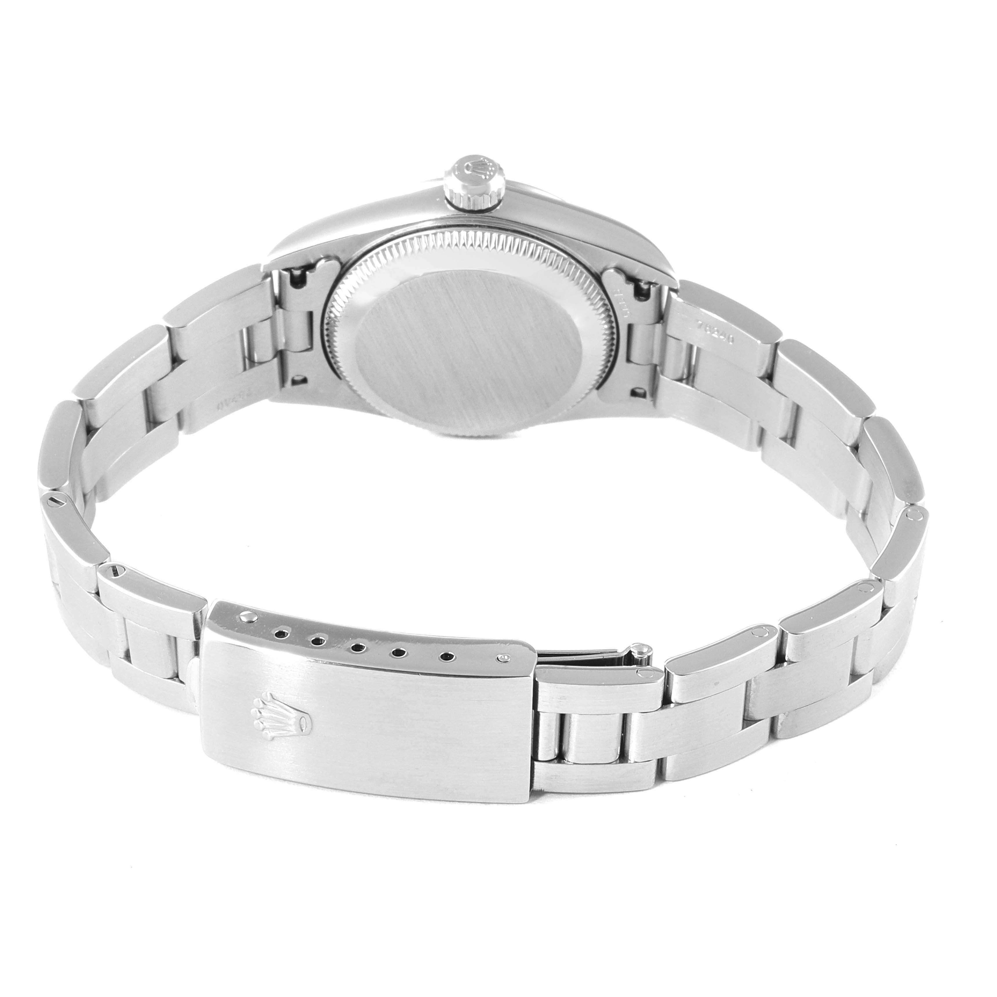 The image shows the back view of a Rolex Oyster Perpetual 76080 Women
s Stainless Steel Pink Dial 76080 Women
s Stainless Steel Pink Dial watch, highlighting the closed case back and metal bracelet with clasp.