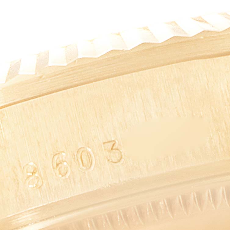 The close-up image shows the serial number engraved on the side of a Rolex President 68278 Women's Yellow Gold Champagne Dial 68278 Women's Yellow Gold Champagne Dial model.