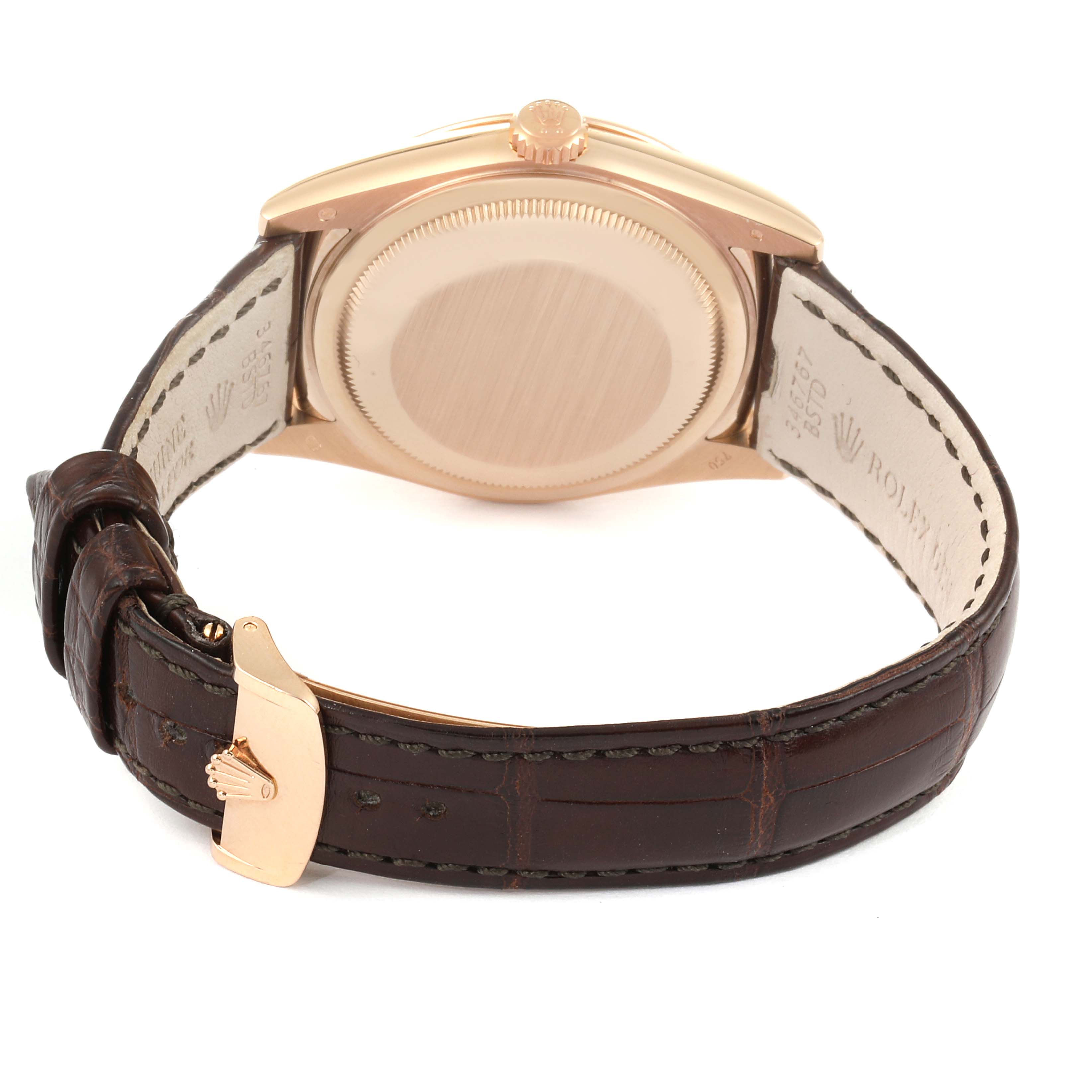 This image shows the back angle of a Rolex President 118135 Men's Rose Gold Brown Dial 118135 Men's Rose Gold Brown Dial watch, highlighting its case back and brown leather strap with a gold clasp.