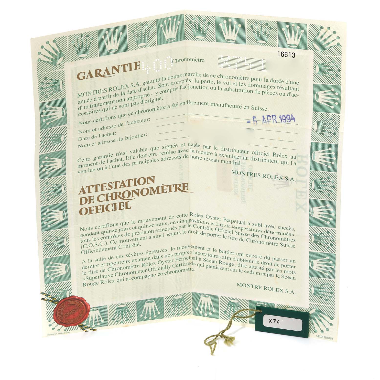 The image shows the warranty and chronometer certification papers for the Rolex Submariner 16613 Men
s Steel and Gold (two tone) Black Dial 16613 Men
s Steel and Gold (two tone) Black Dial model, displayed flat.