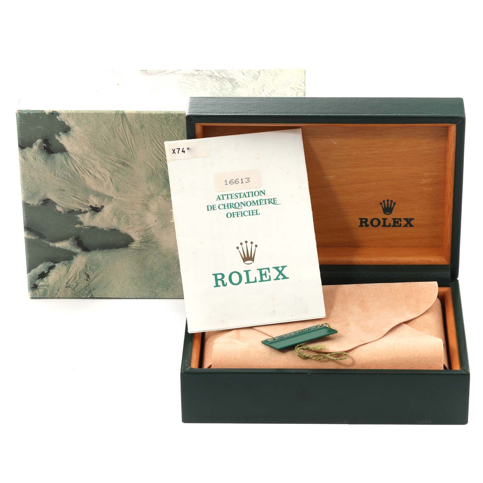 The image shows the inner and outer boxes and certification paper for a Rolex Submariner 16613 Men
s Steel and Gold (two tone) Black Dial 16613 Men
s Steel and Gold (two tone) Black Dial model.