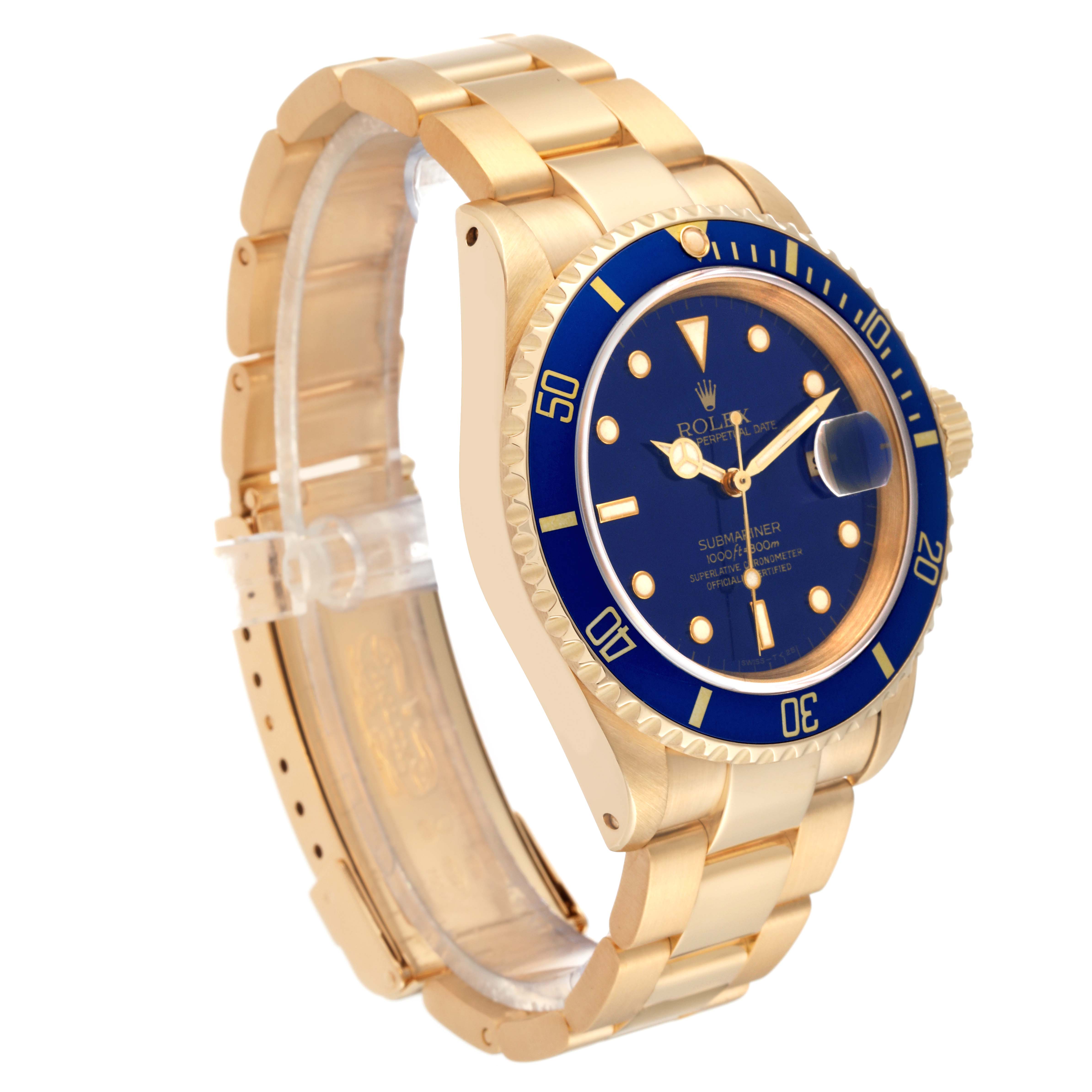 The image shows a Rolex Submariner 16618 Men's Yellow Gold Blue Dial 16618 Men's Yellow Gold Blue Dial watch at a three-quarter angle, highlighting its blue dial, bezel, and gold bracelet.