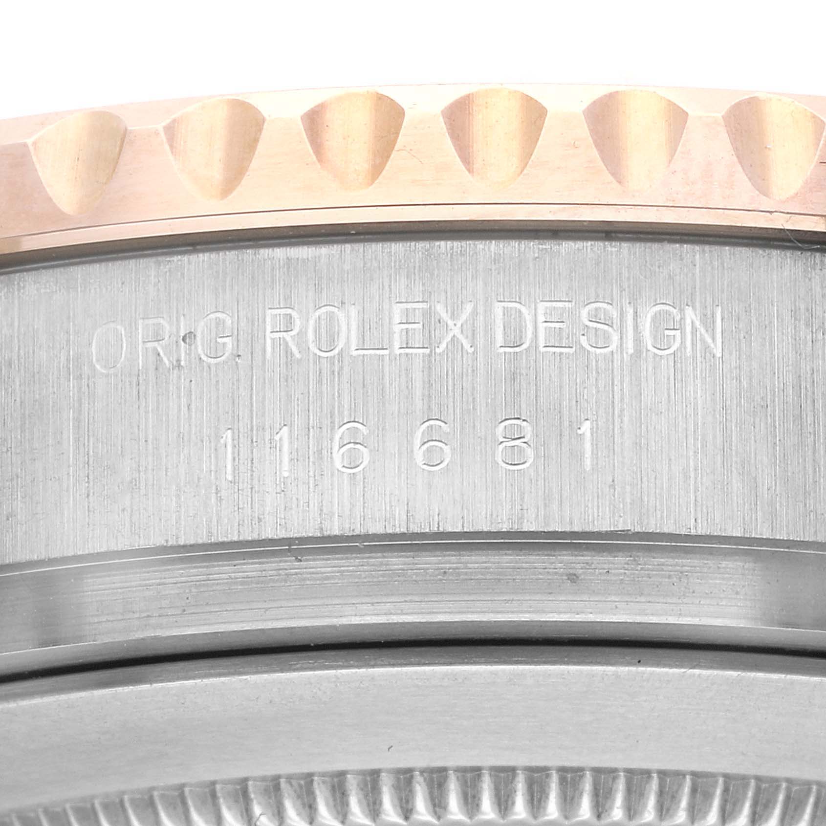 This close-up image shows the engraving on the side case and bezel of a Rolex Yacht-Master 116681 Men's Steel and Gold (two tone) White Dial 116681 Men's Steel and Gold (two tone) White Dial watch.