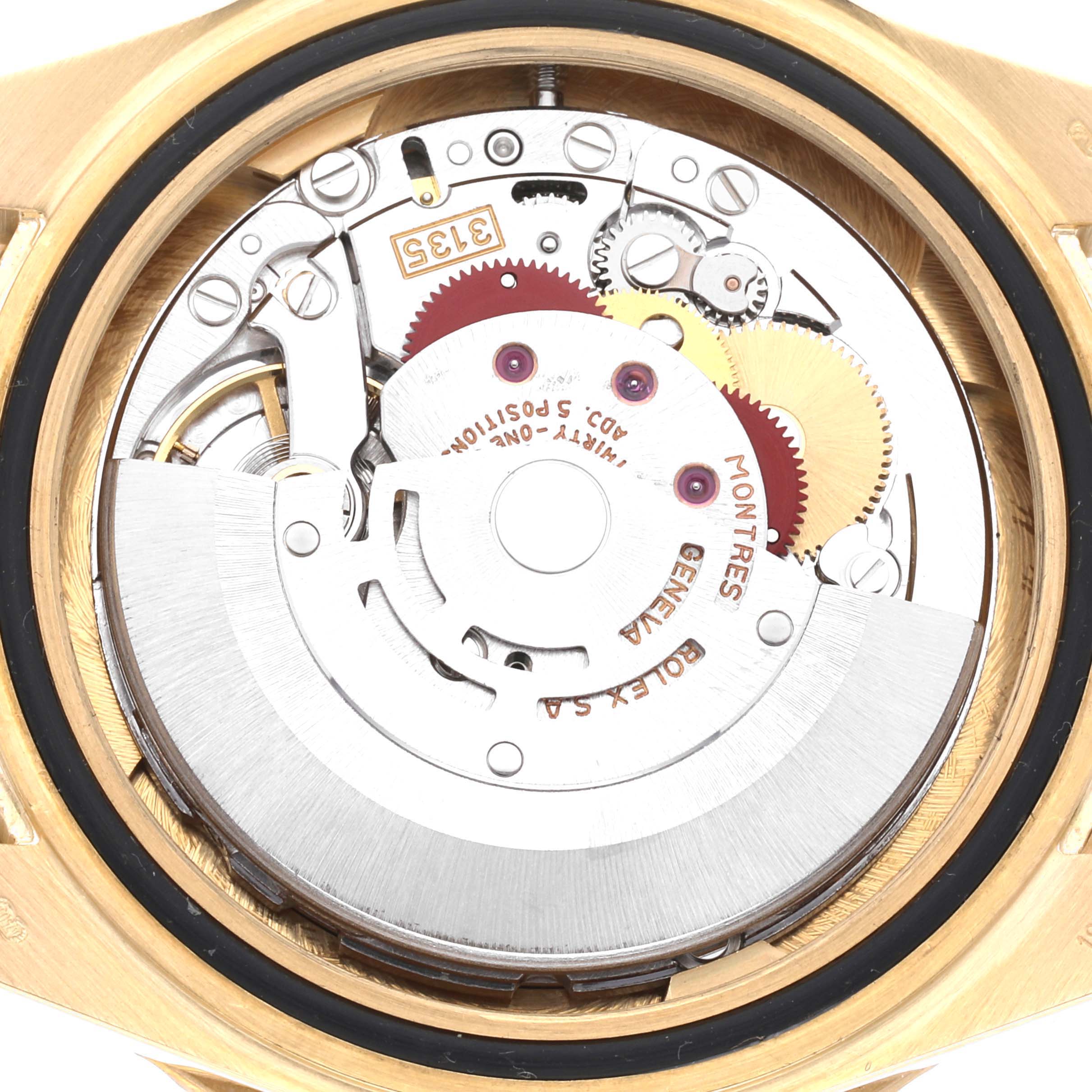 The image shows the intricate movement mechanism of a Rolex Yacht-Master 16628NGS Men's Yellow Gold Mother of Pearl Dial 16628NGS Men's Yellow Gold Mother of Pearl Dial watch from a rear angle with the case back removed.