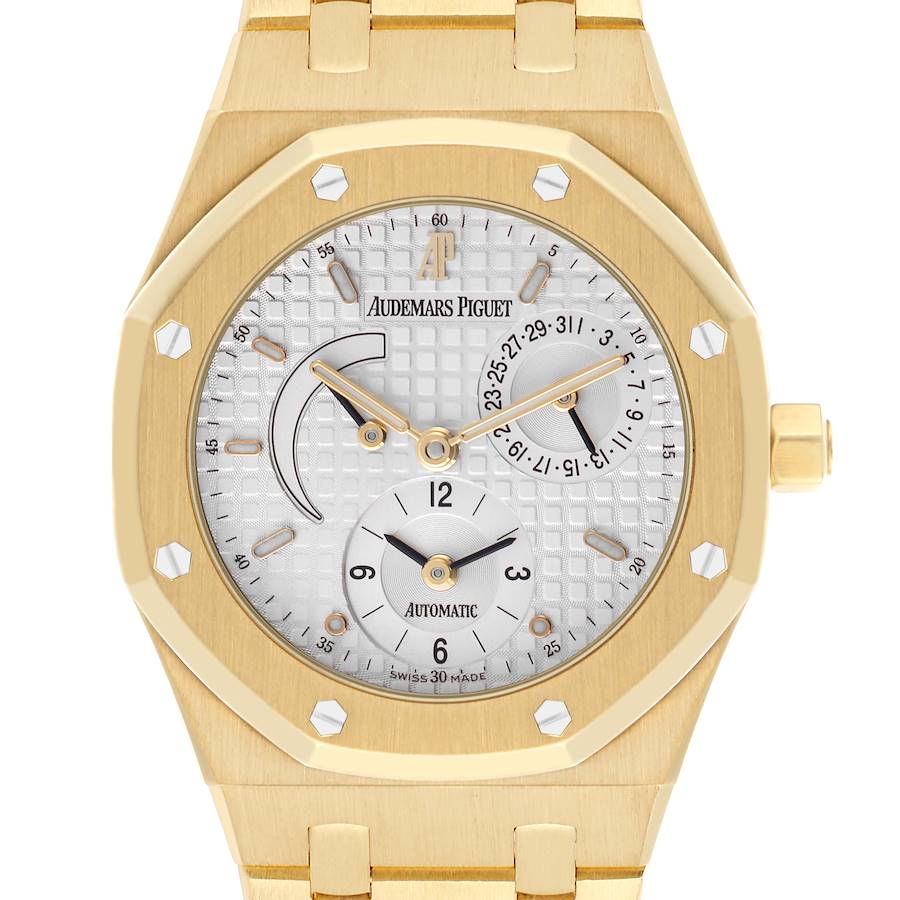 The Audemars Piguet Royal Oak watch is shown from a front angle, highlighting the dial, gold case, and octagonal bezel.