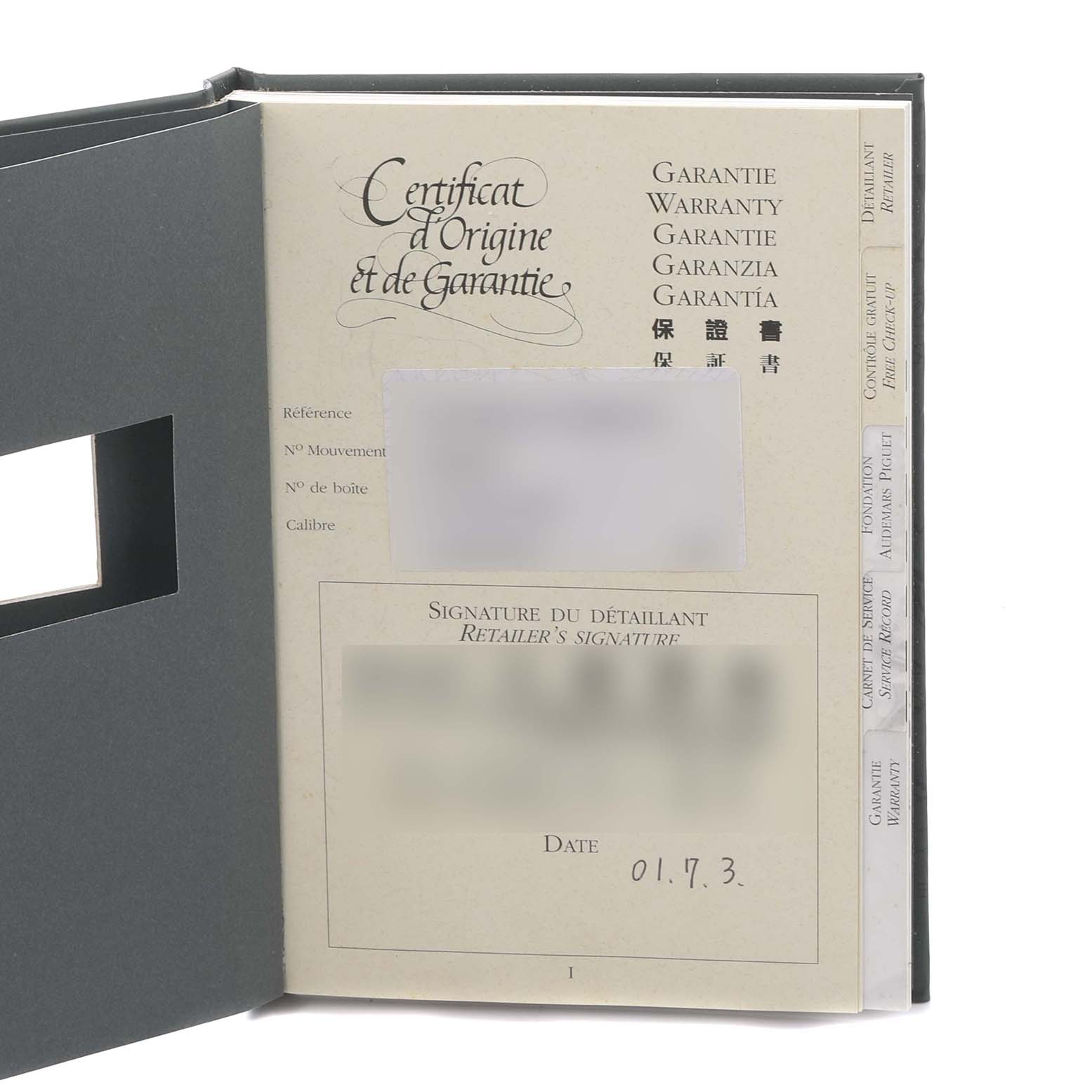 The image shows the warranty certificate for the Royal Oak model by Audemars Piguet, with sections for reference, movement, and signature.