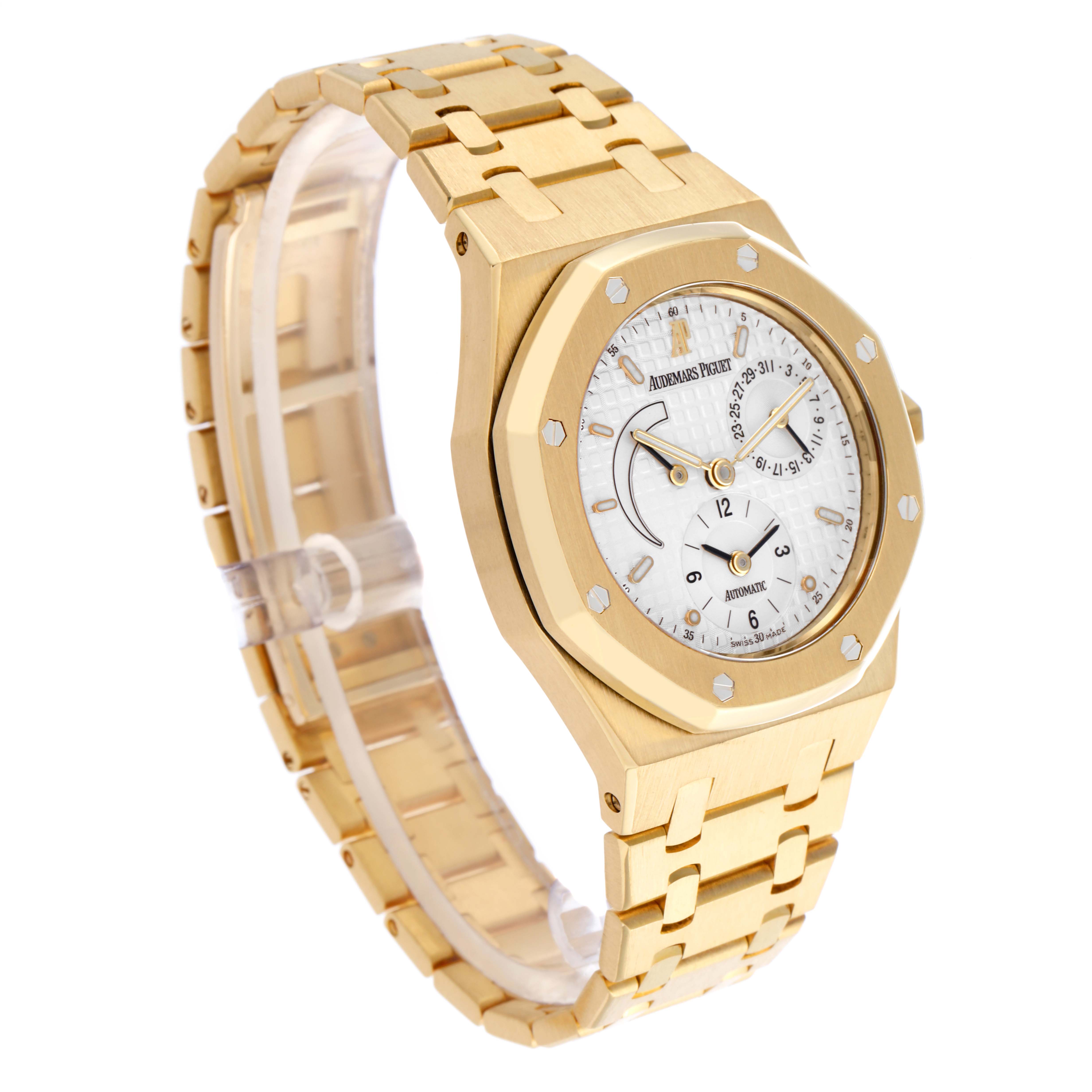 The Audemars Piguet Royal Oak 25730BA.OO.0789BA.06 Men's Yellow Gold Silver Dial 25730BA.OO.0789BA.06 Men's Yellow Gold Silver Dial watch is shown at a three-quarter angle, highlighting the face, bezel, and bracelet.