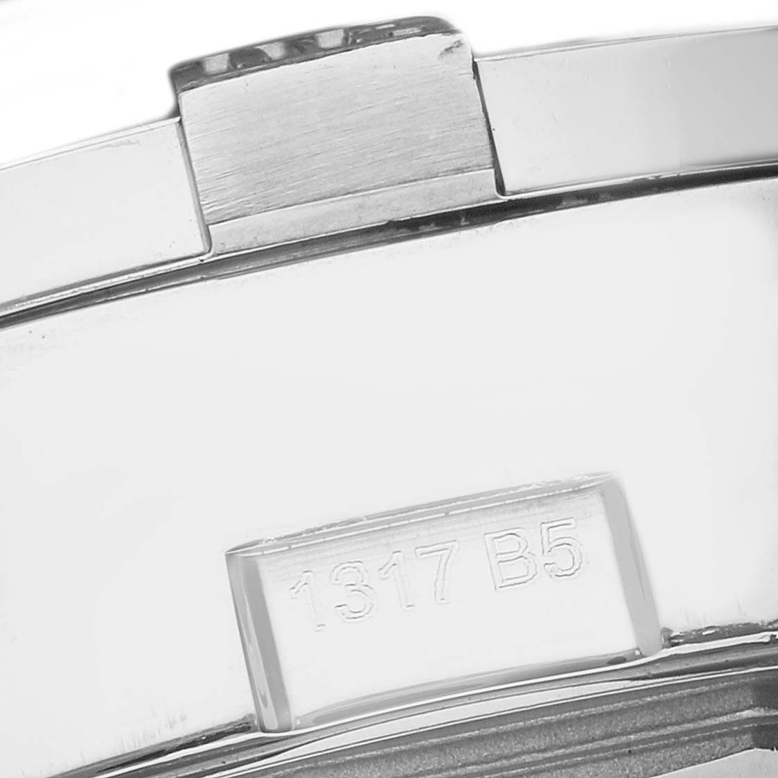 The image shows a close-up of the clasp on a Breitling Avenger A13381 Men's Stainless Steel Mother of Pearl Dial A13381 Men's Stainless Steel Mother of Pearl Dial watch, featuring the model number "1317 B5."