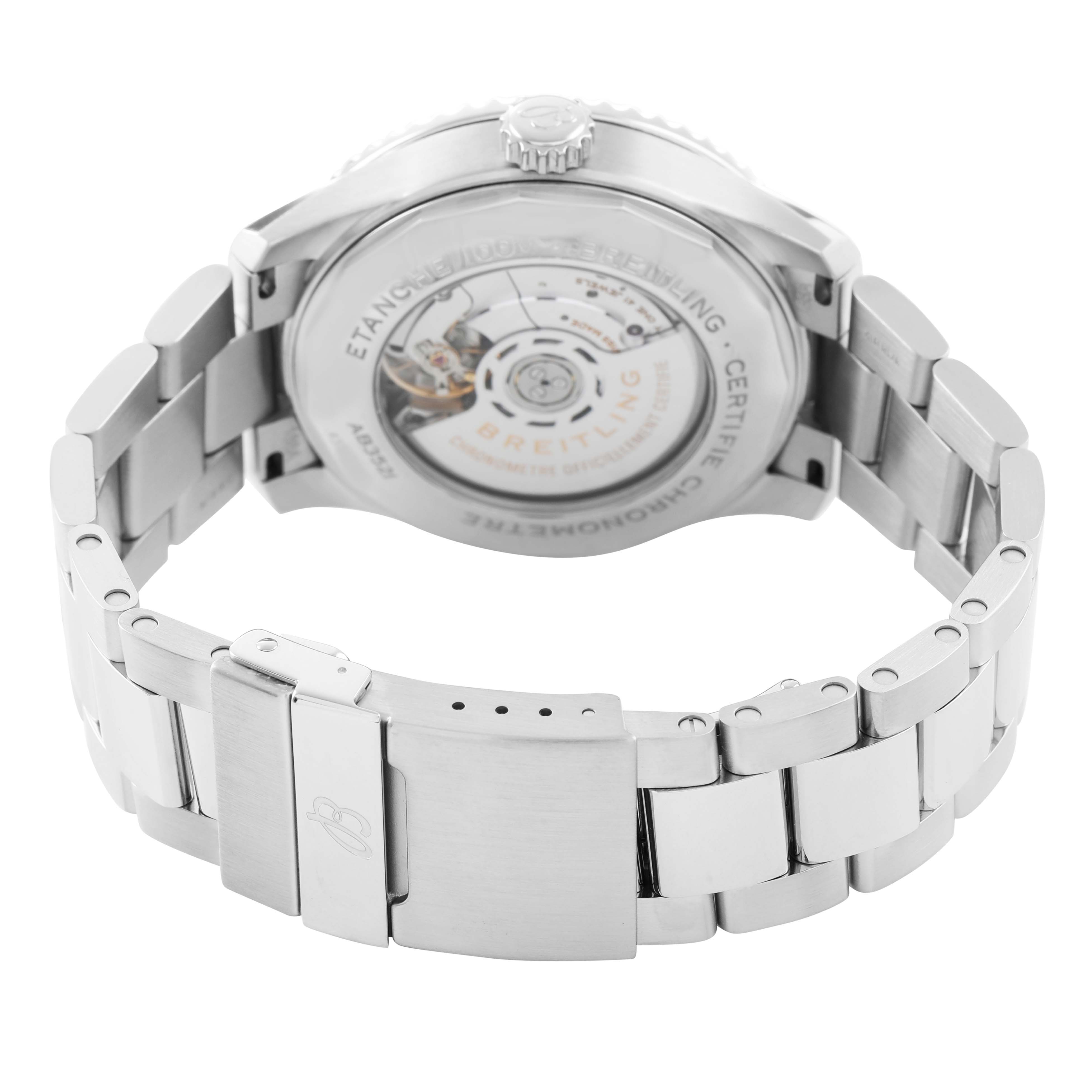 The image shows the back view of a Breitling Aviator AB3521U41B1A1 Men's Stainless Steel Blue Dial watch, highlighting the exhibition case back and metal bracelet clasp.