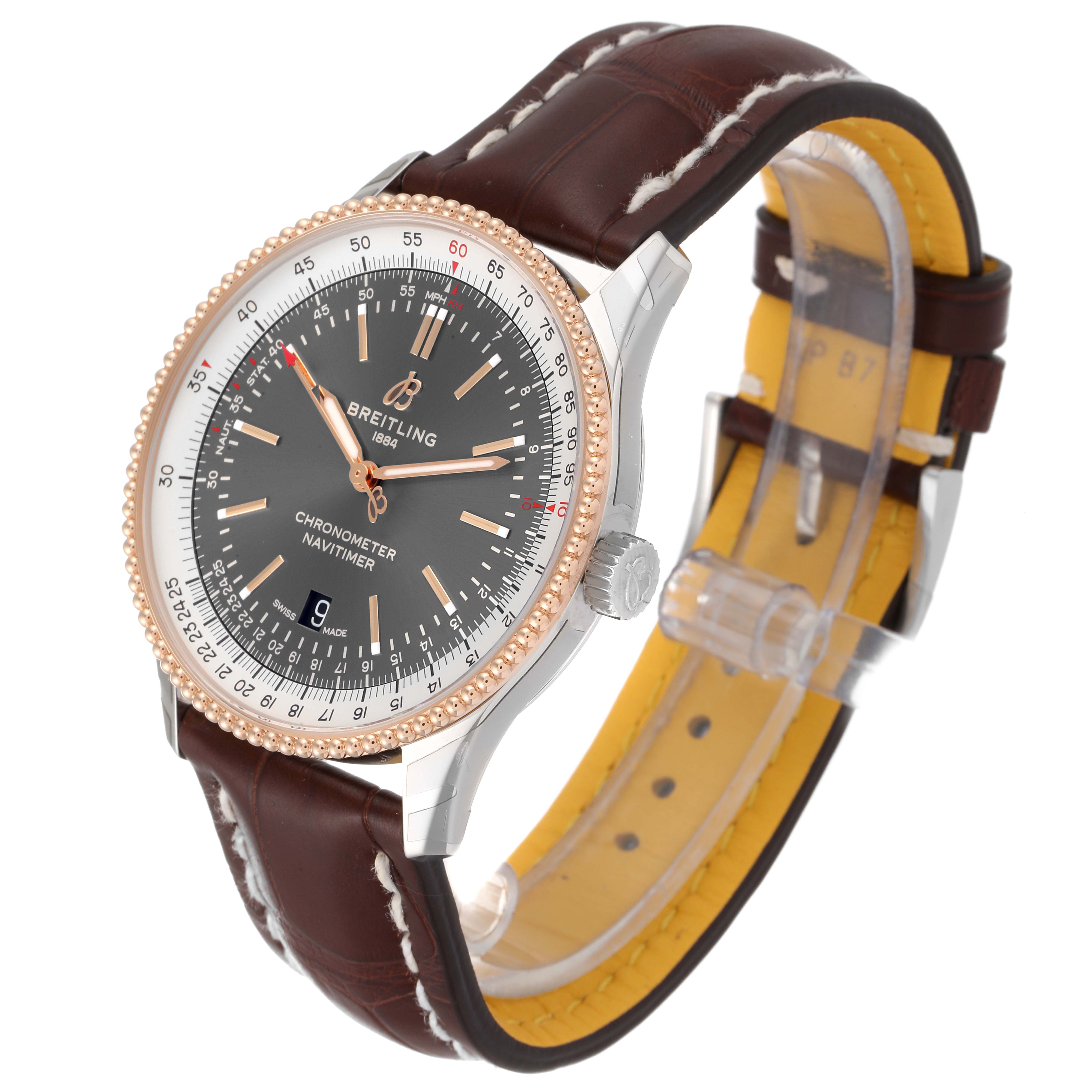 This image shows the Breitling Navitimer U17326211M1P1 Men's Stainless Steel Grey Dial U17326211M1P1 Men's Stainless Steel Grey Dial watch at an angled view, displaying its face, bezel, case, and leather strap.