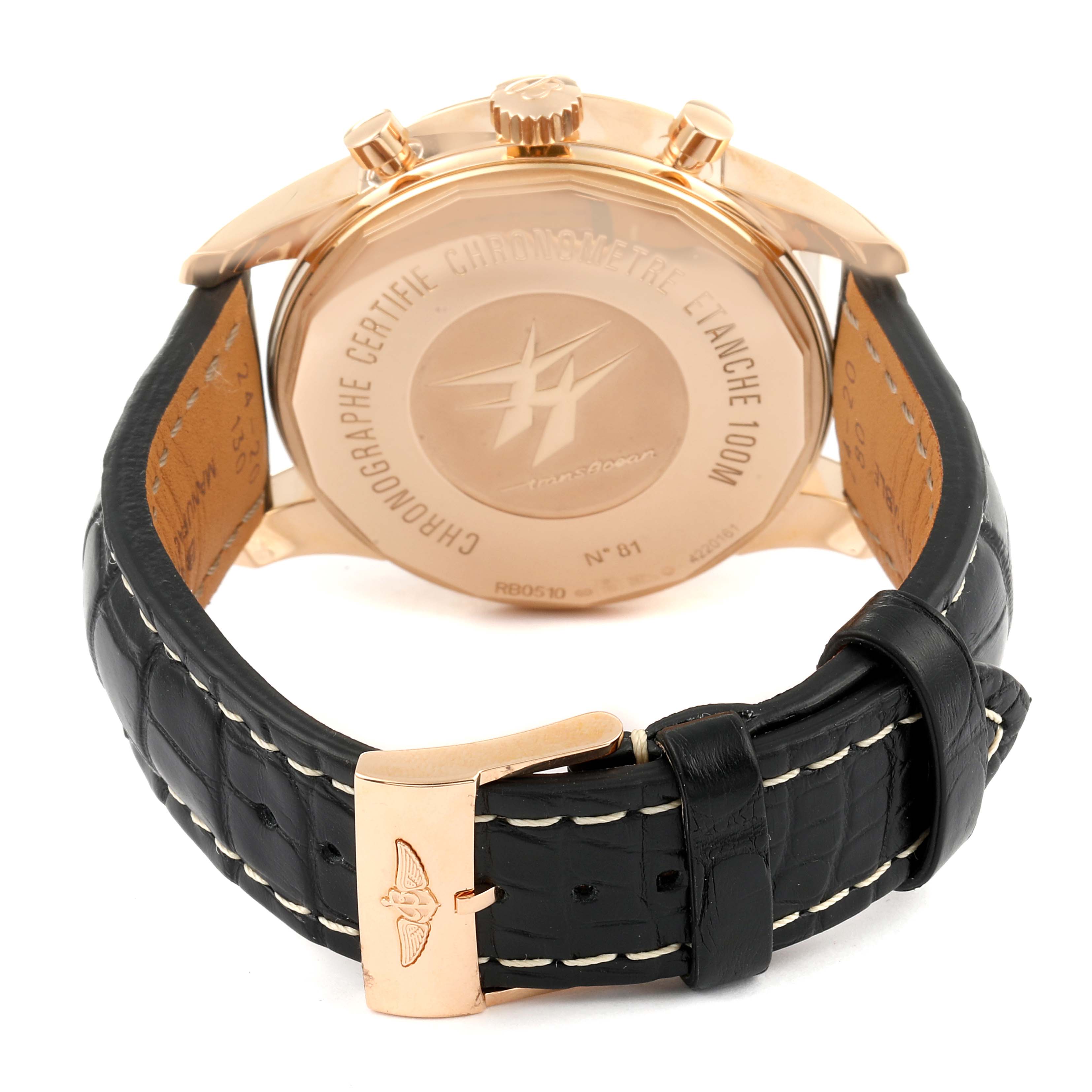 The image shows the back case and strap of the Breitling Transocean RB0510U4-BB63BKLD Men's Rose Gold White Dial RB0510U4-BB63BKLD Men's Rose Gold White Dial watch, highlighting the engraving and clasp.