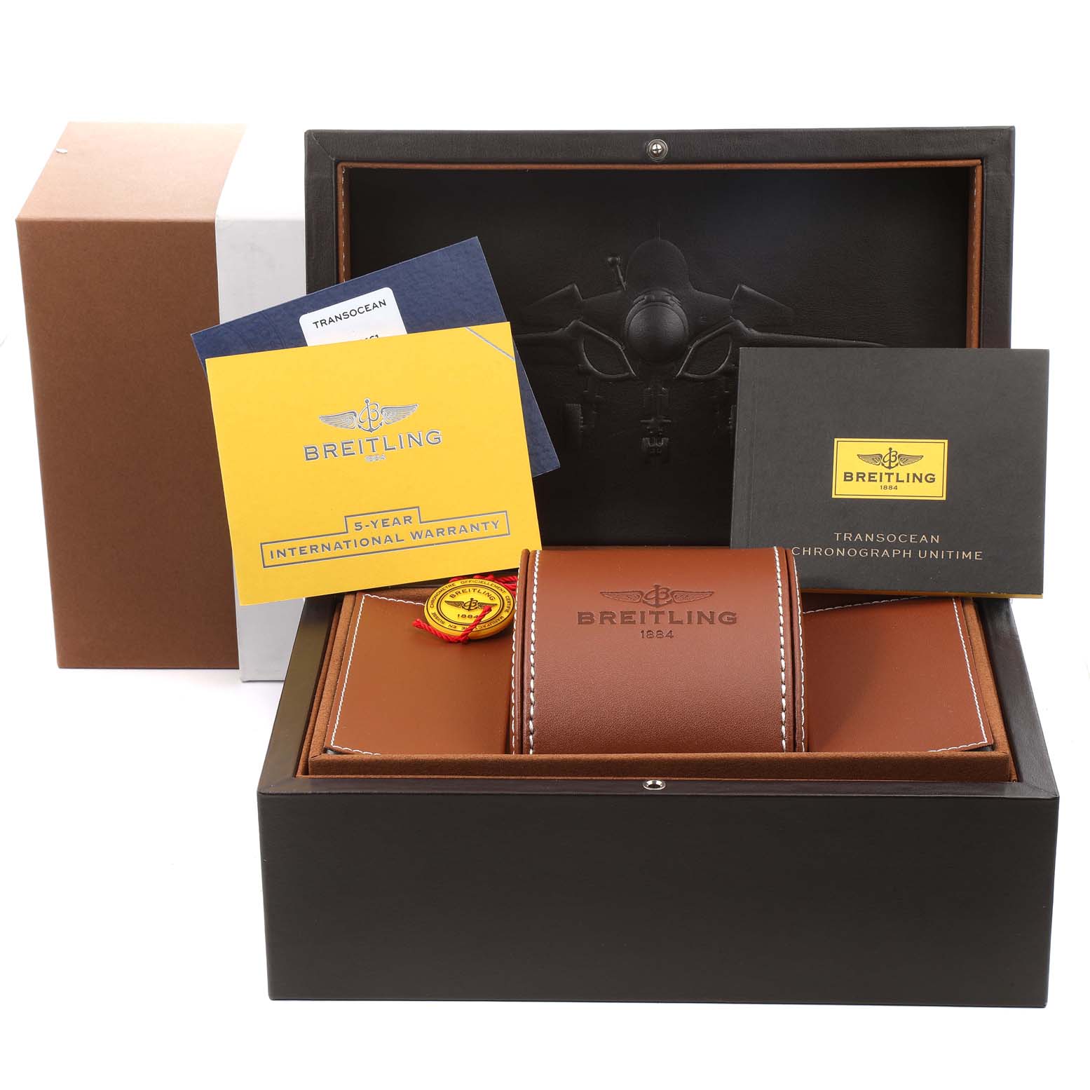 The image shows the packaging and accessories, including the box, warranty card, and case, of a Breitling Transocean RB0510U4-BB63BKLD Men's Rose Gold White Dial RB0510U4-BB63BKLD Men's Rose Gold White Dial watch at a front angle.