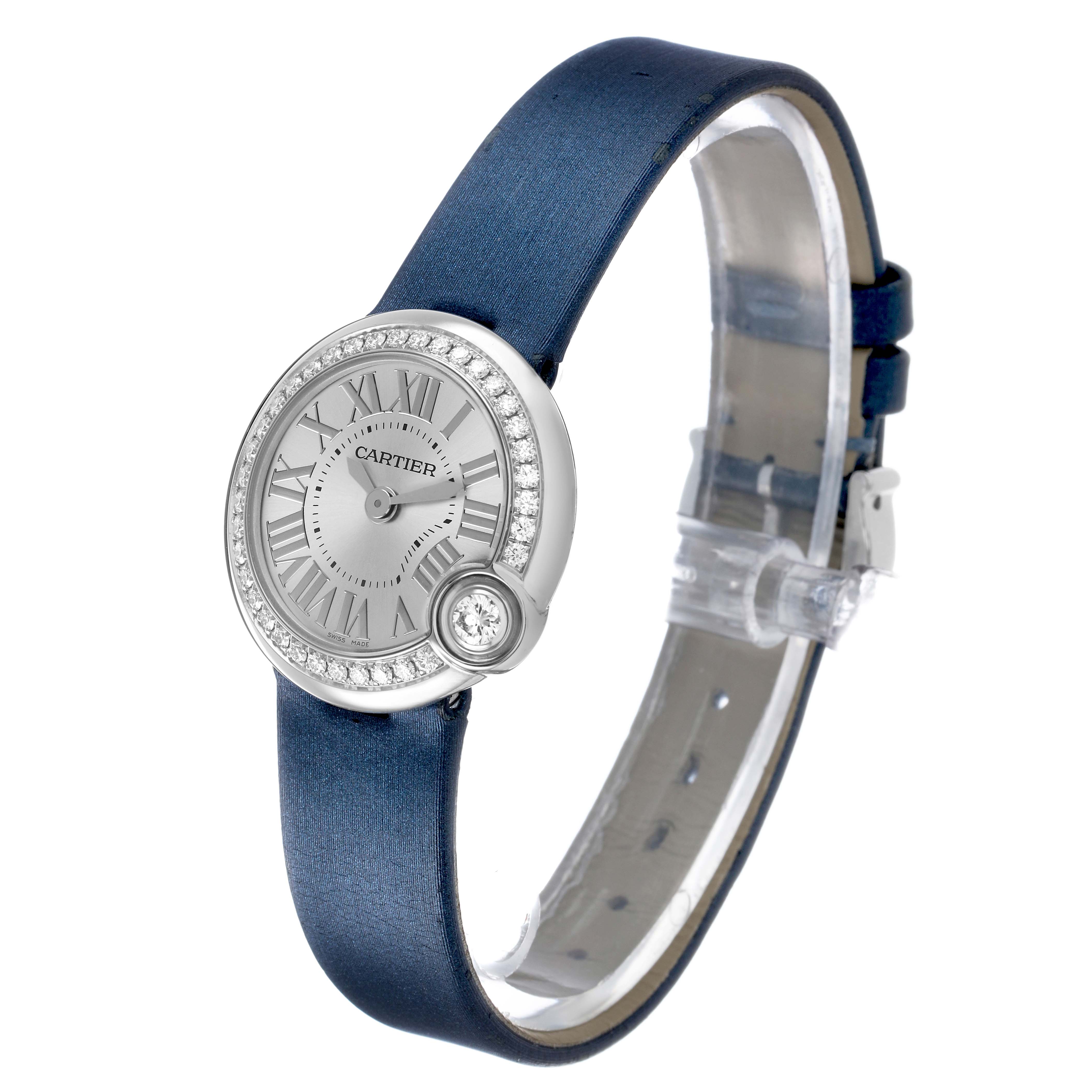 The Cartier Ballon Blanc W4BL0002 Women's Stainless Steel Silver Dial watch is shown at a slight angle, displaying its face, strap, and diamond embellishment on the bezel.