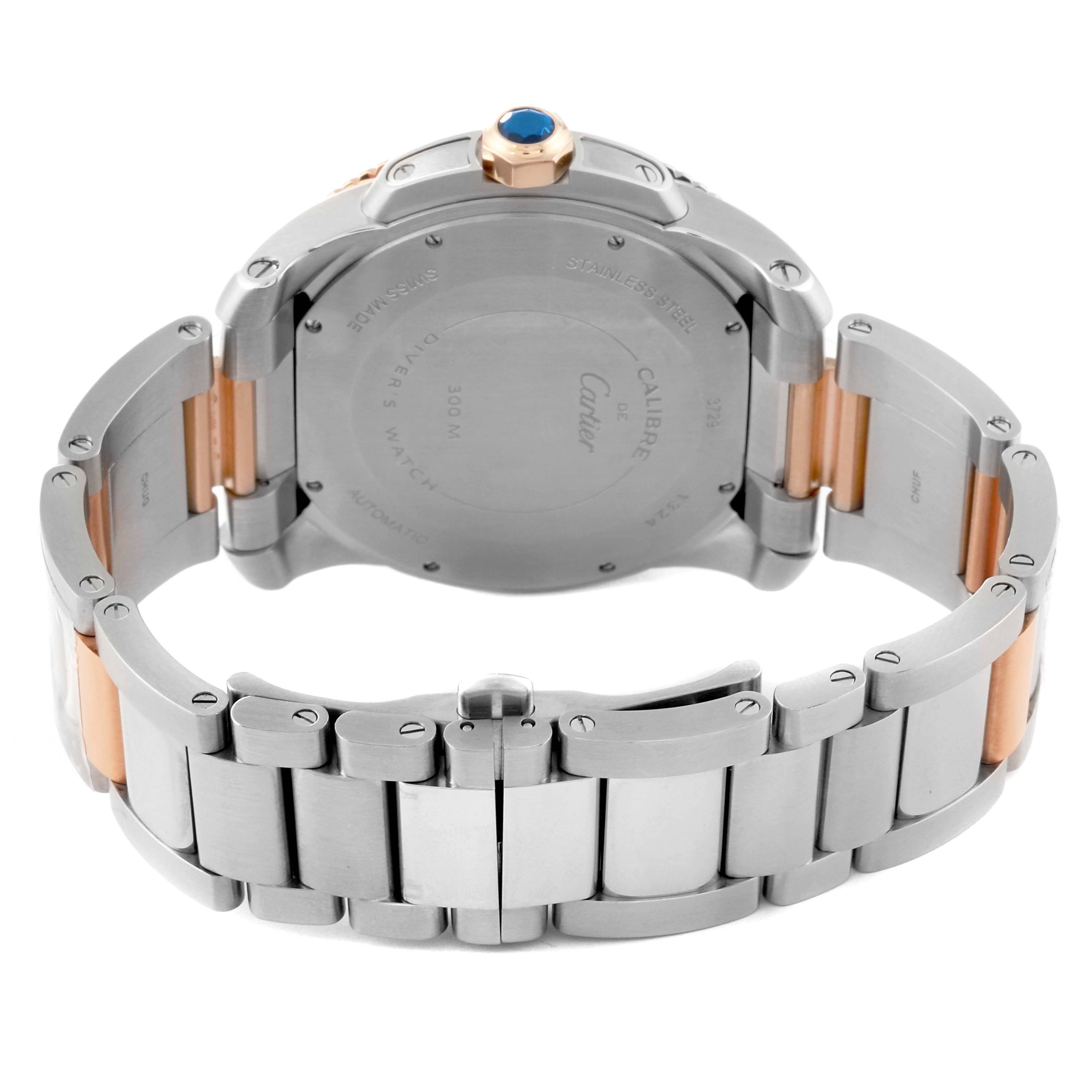 This is a rear view of a Calibre de Cartier watch by Cartier, showing its back case and two-tone bracelet band.